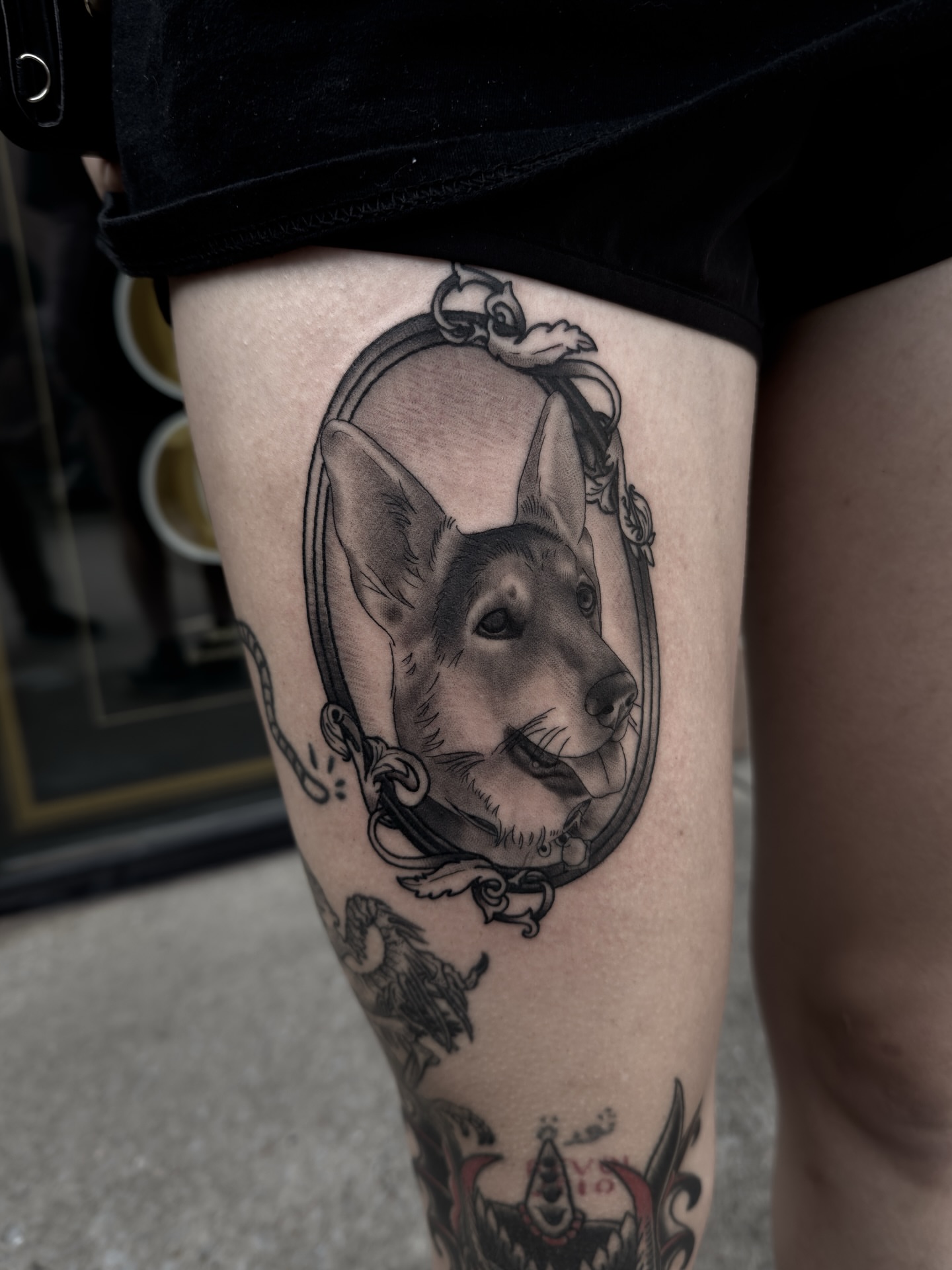 Dog portrait realism tattoo on the thigh by Blake Owens, Nashville, Tennessee