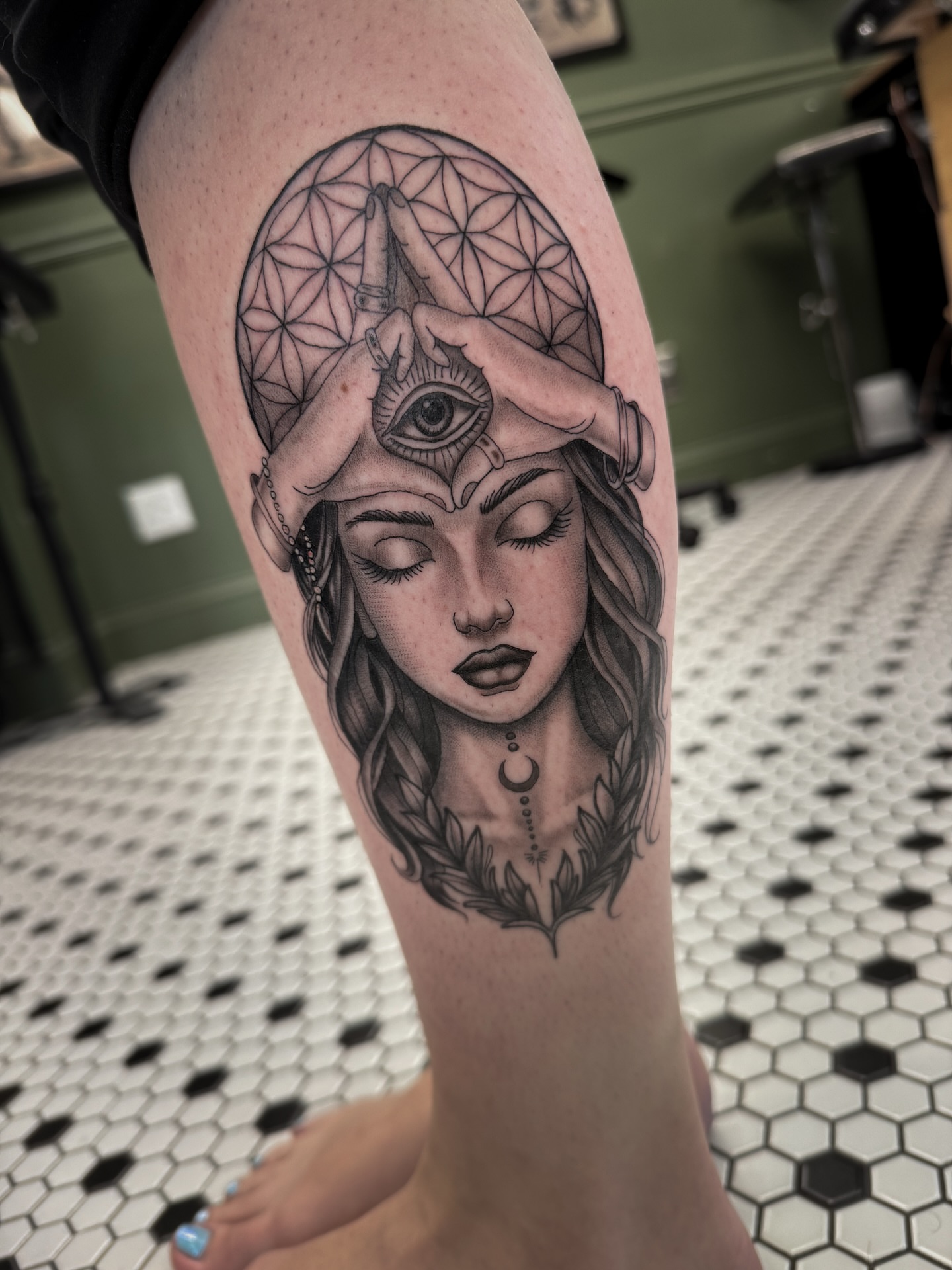 Woman with eyes realism tattoo on the thigh by Blake Owens, Nashville, Tennessee