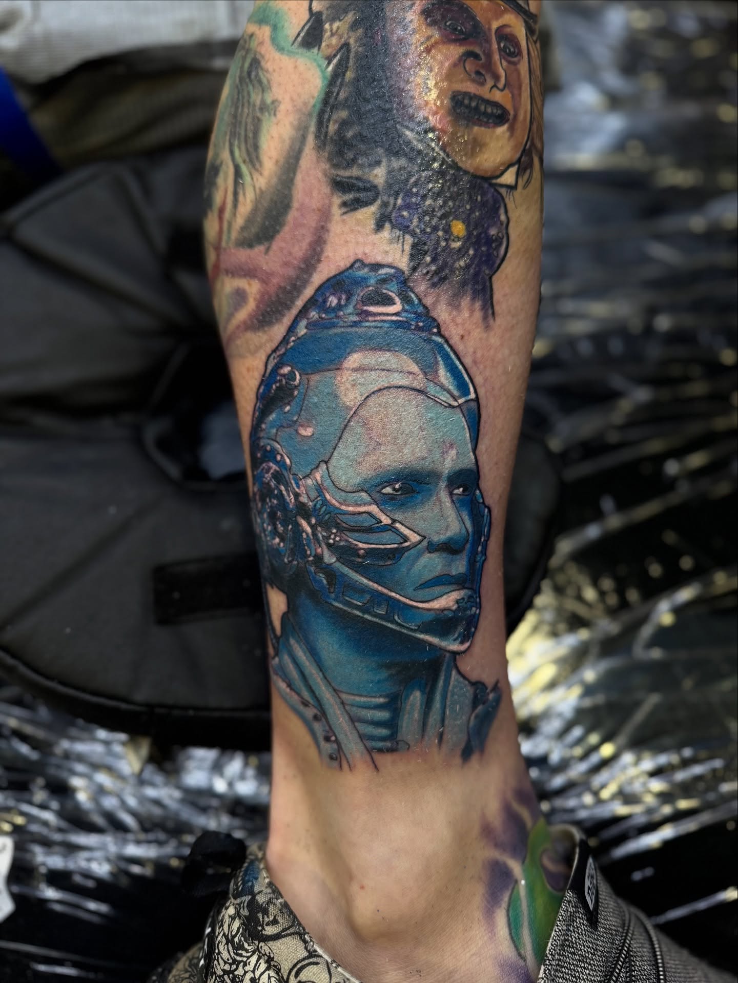 Cyborg head realism tattoo on the forearm by David C. McGhee