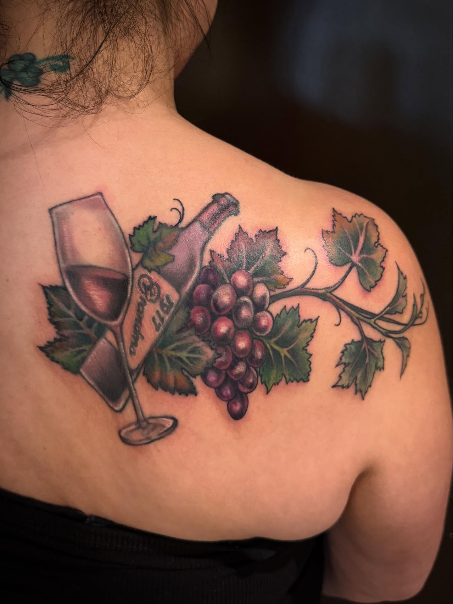 Wine and grapes realism tattoo on the shoulder by Brennan Walker, Orem, Utah
