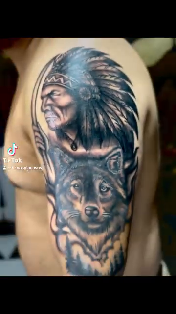 Native American chief and wolf realism tattoo by Eli Flores