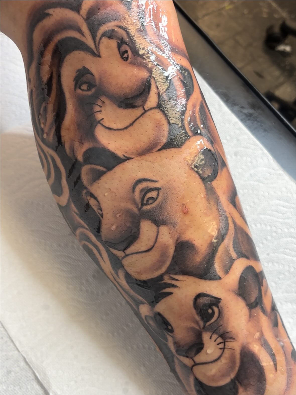 Lion family realism tattoo on the forearm by FleeDott 🇨🇴
