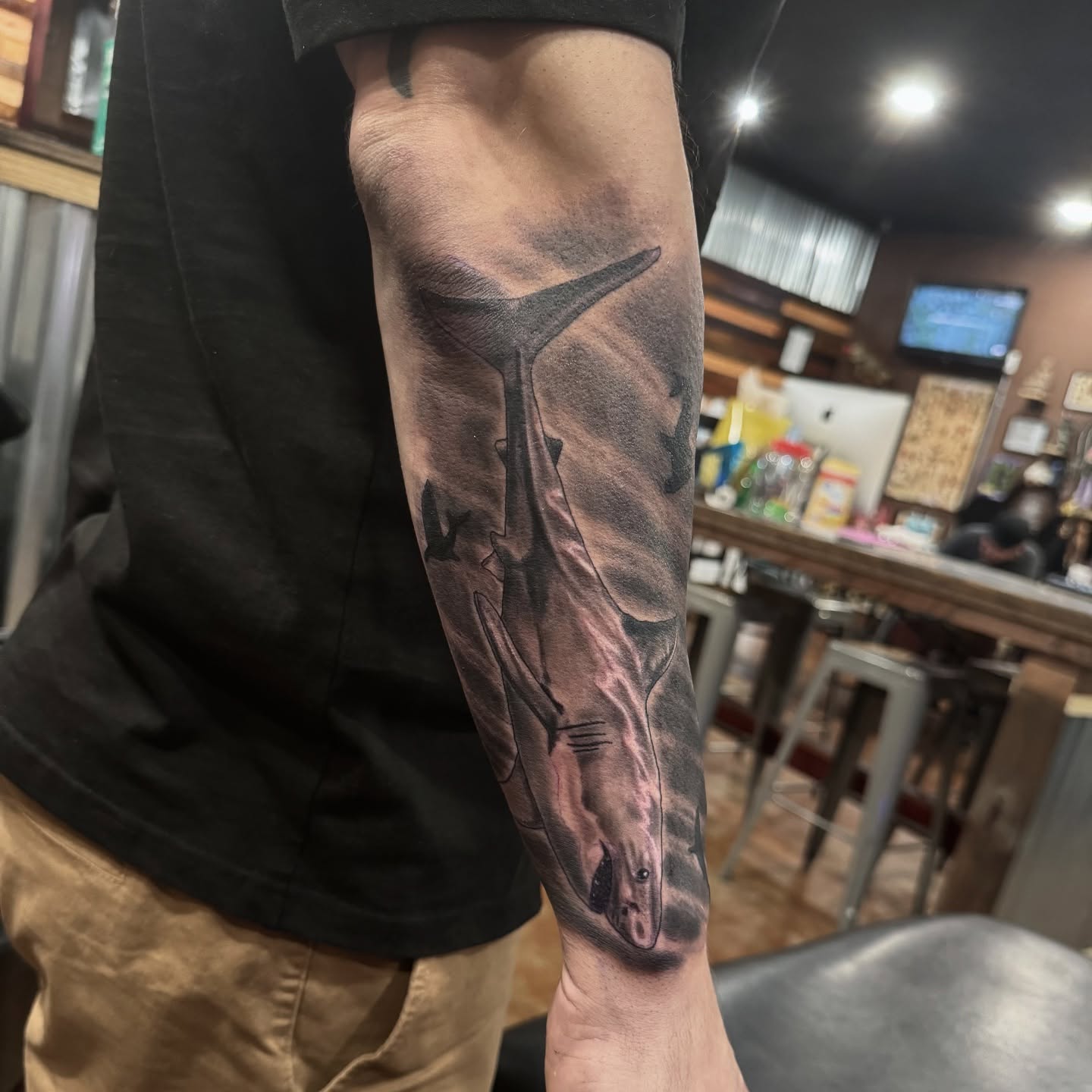 Whale realism tattoo on the forearm by David C. McGhee