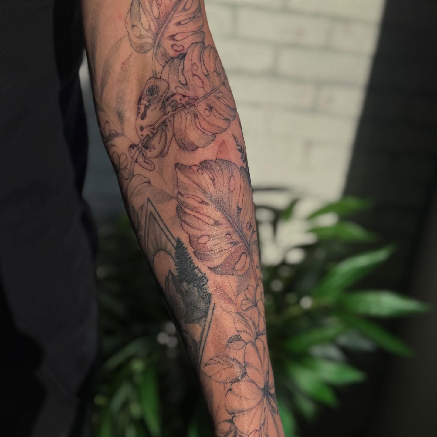 Frog and leaves realism tattoo on the forearm by ❀ Moo, Mount Laurel, New Jersey