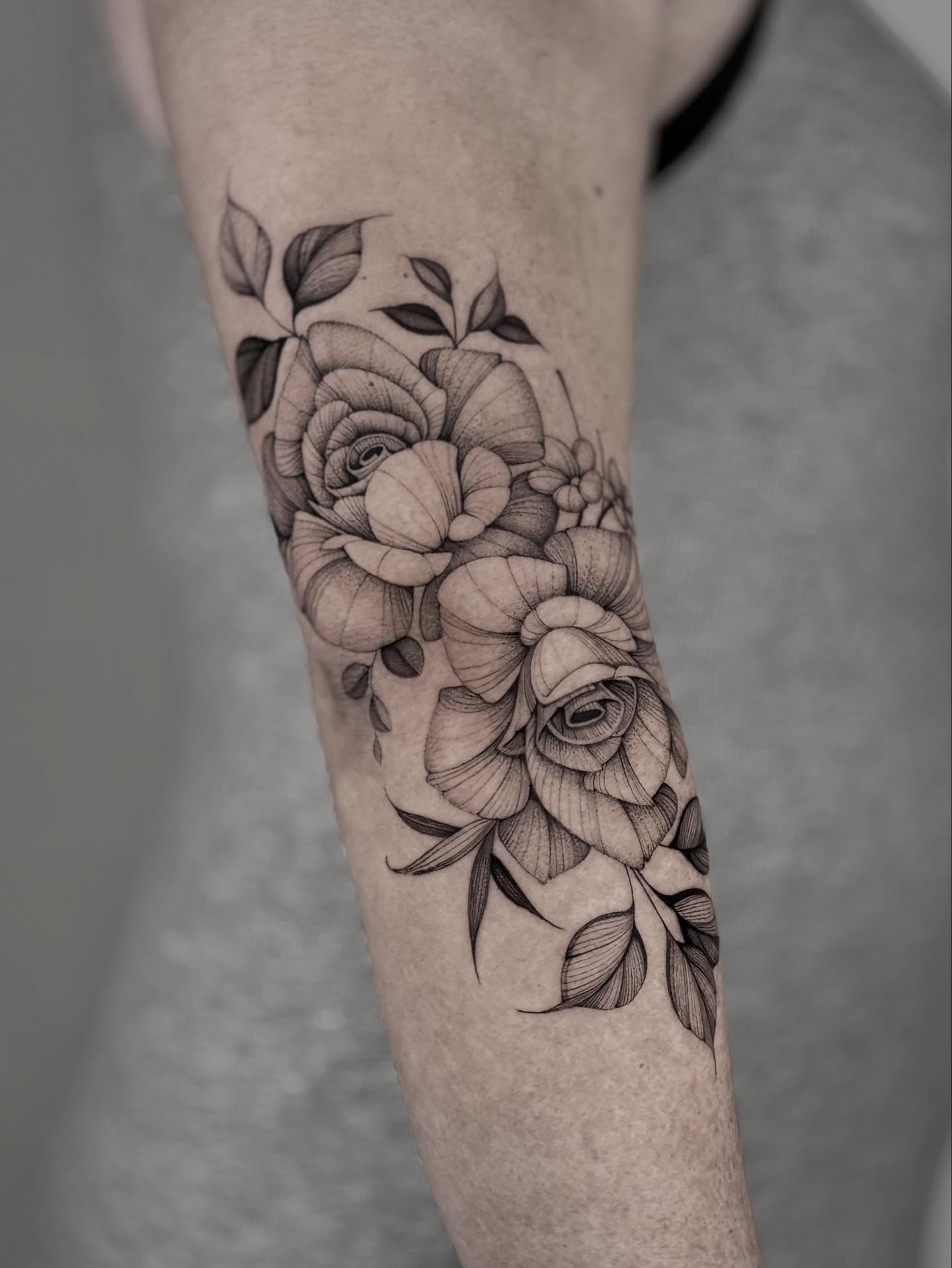 Flowers realism tattoo on the forearm by Brittney Naami, San Francisco, California