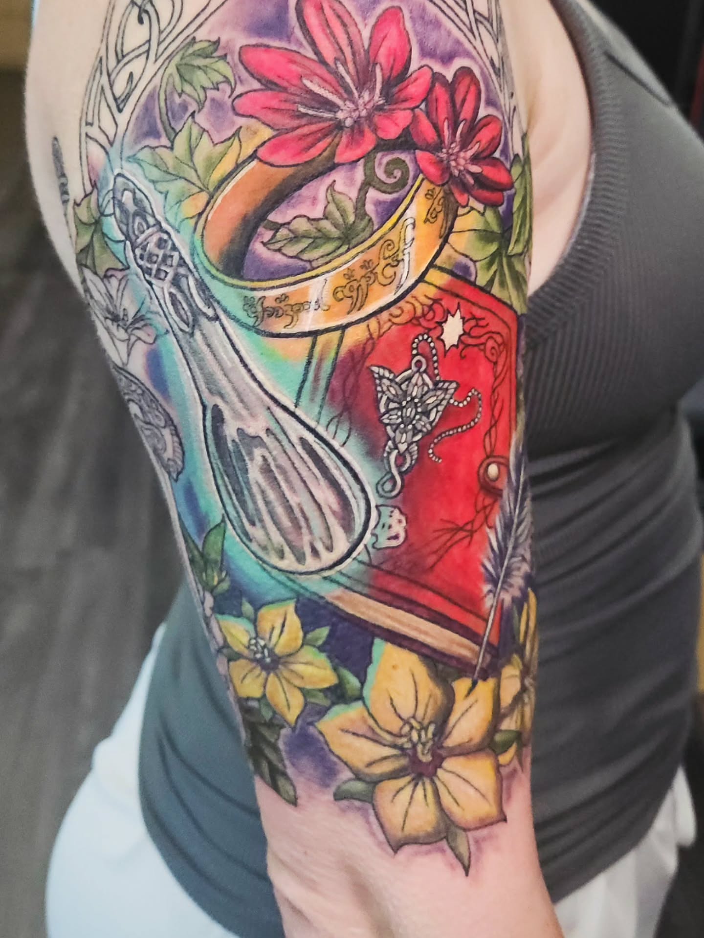Book and harp new school tattoo on the forearm by Angie Griffith 🥰, Glendale, Arizona