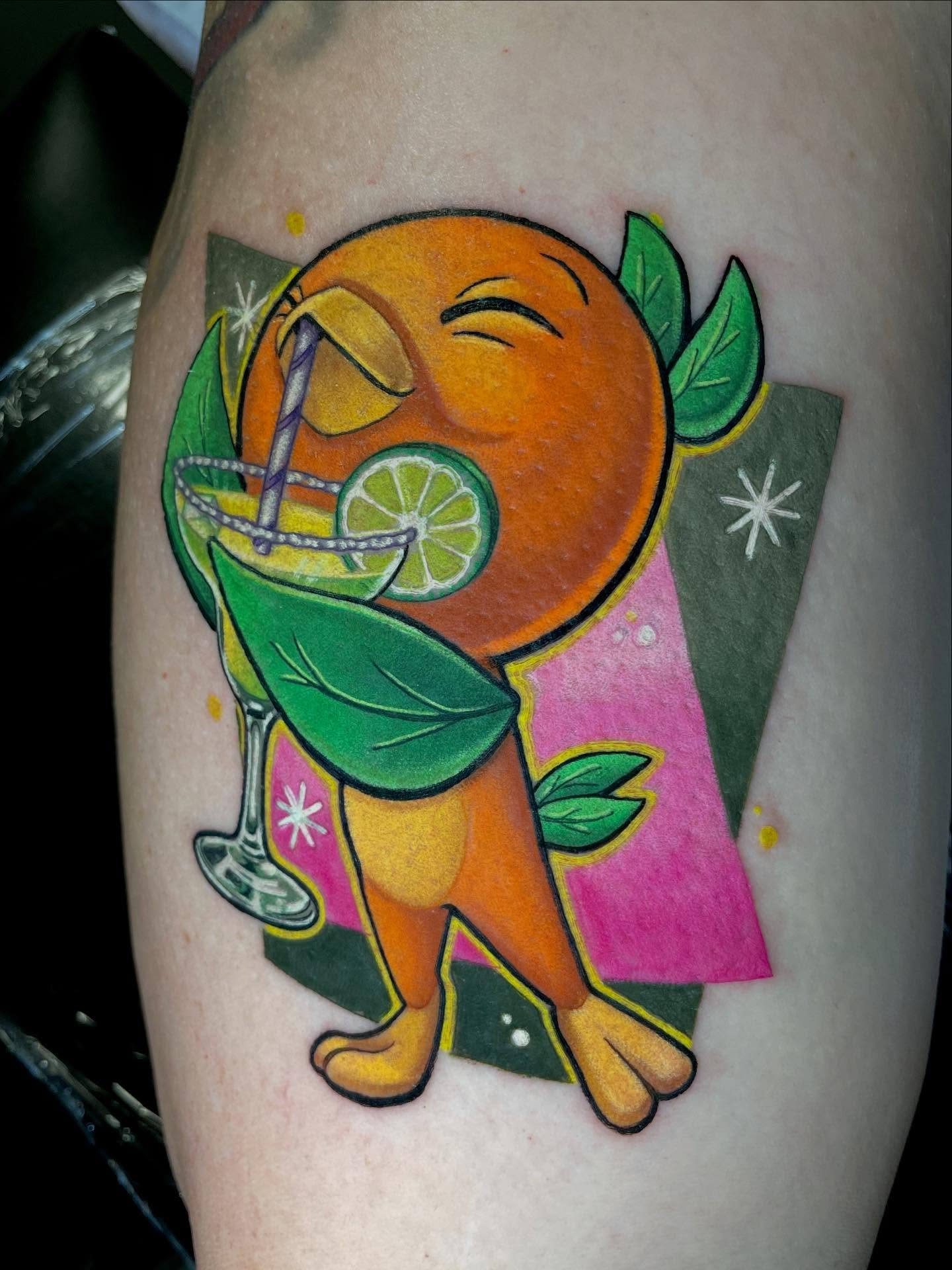 Orange character new school tattoo on the thigh by Shana 🍊Orlando,Fl