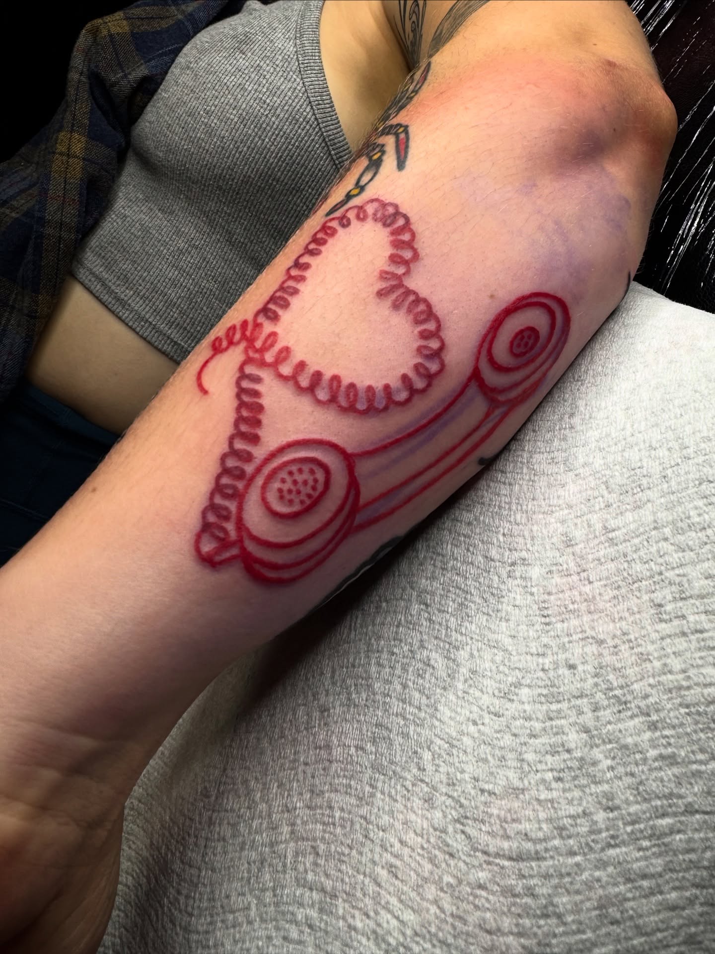 Telephone American traditional tattoo on the forearm by Saffron Florea, Tiffin, Ohio