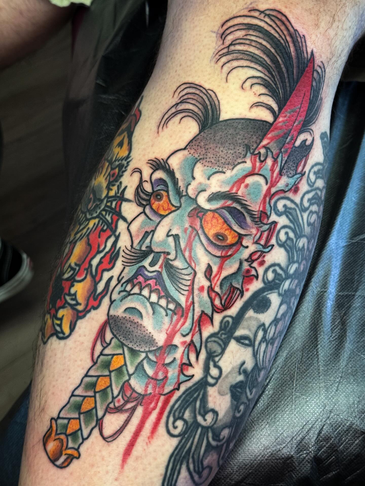 Demon japanese irezumi tattoo on the forearm by Bob Lackner