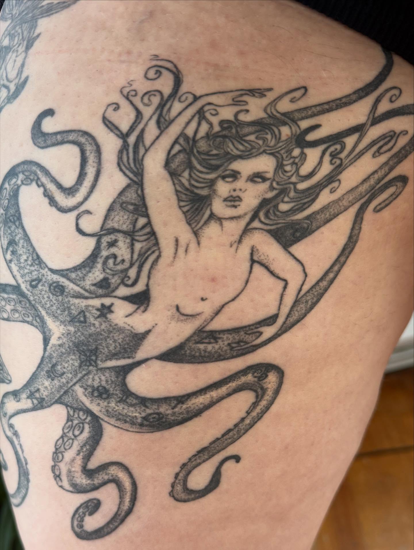 Mermaid and octopus realism tattoo on the thigh by Christen Wolfe CA Tattooer