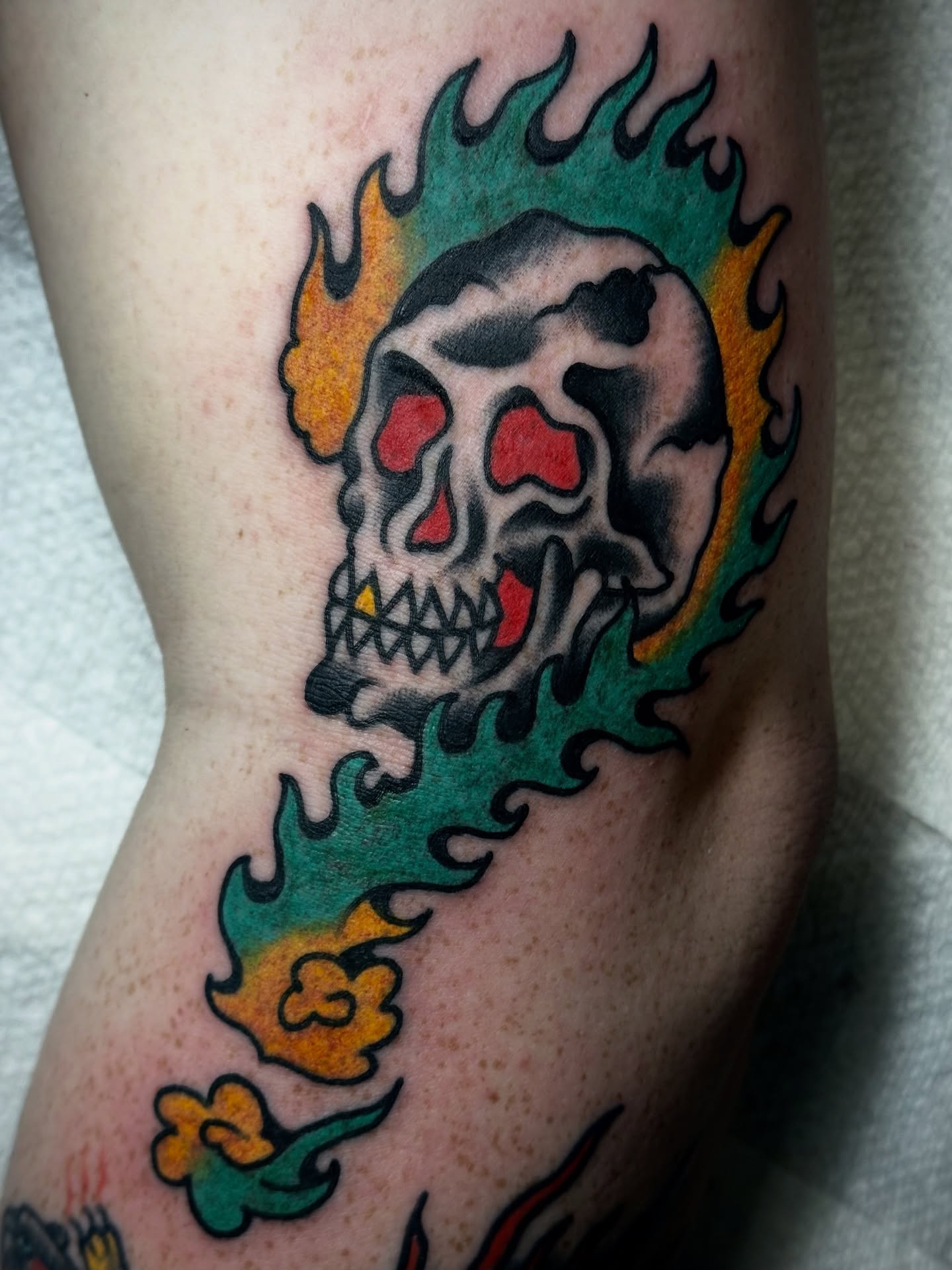 Flaming skull American traditional tattoo on the forearm by Kyle O’Hara ॐ, Nashville, Tennessee