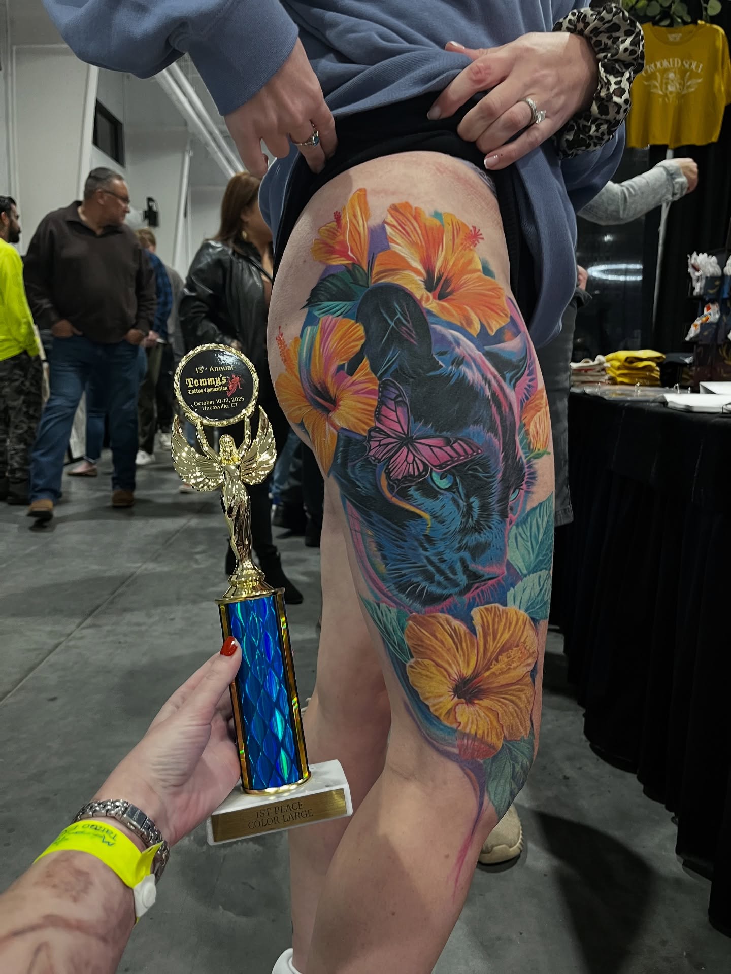 Cat and flowers new school tattoo on the thigh by Eva Williams