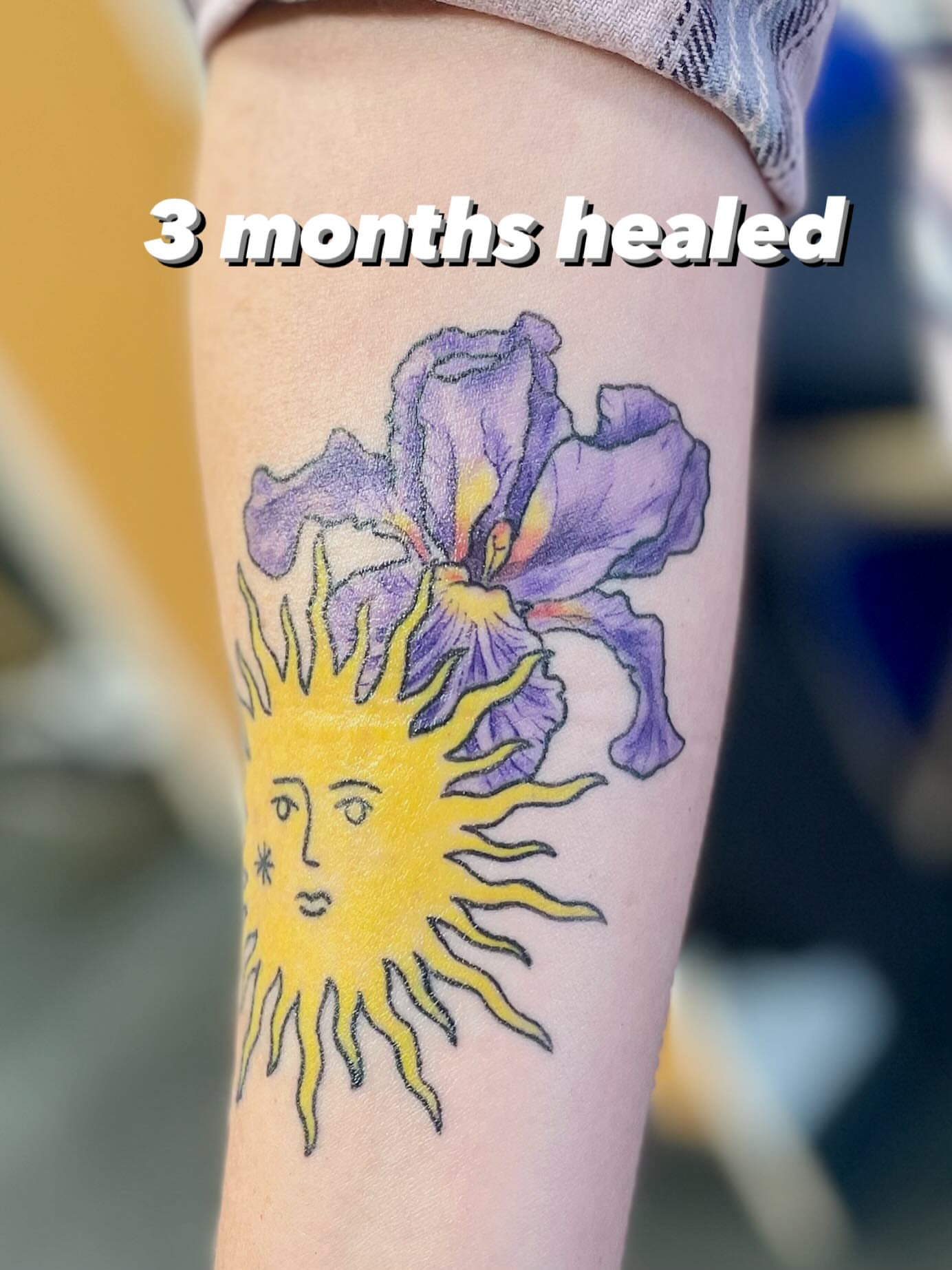 Iris and sun new school tattoo on the forearm by ๐ท๐ซKevan๐๐ท