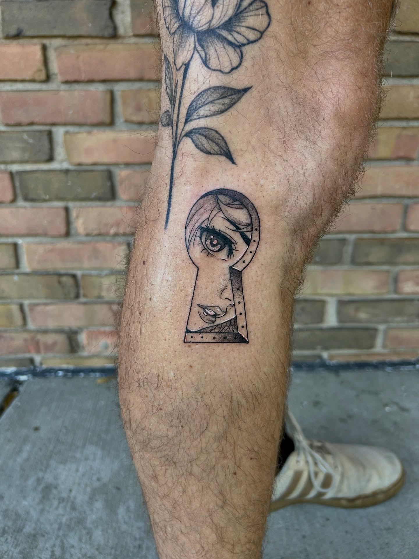 Keyhole woman dotwork tattoo on the forearm by Taylor Heidtbrink