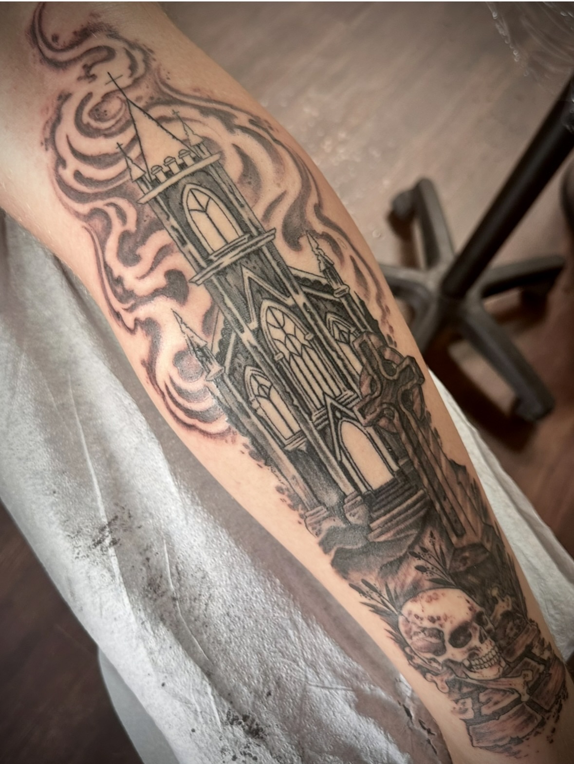 Gothic cathedral dark realism tattoo on the forearm by Culleton Paramore