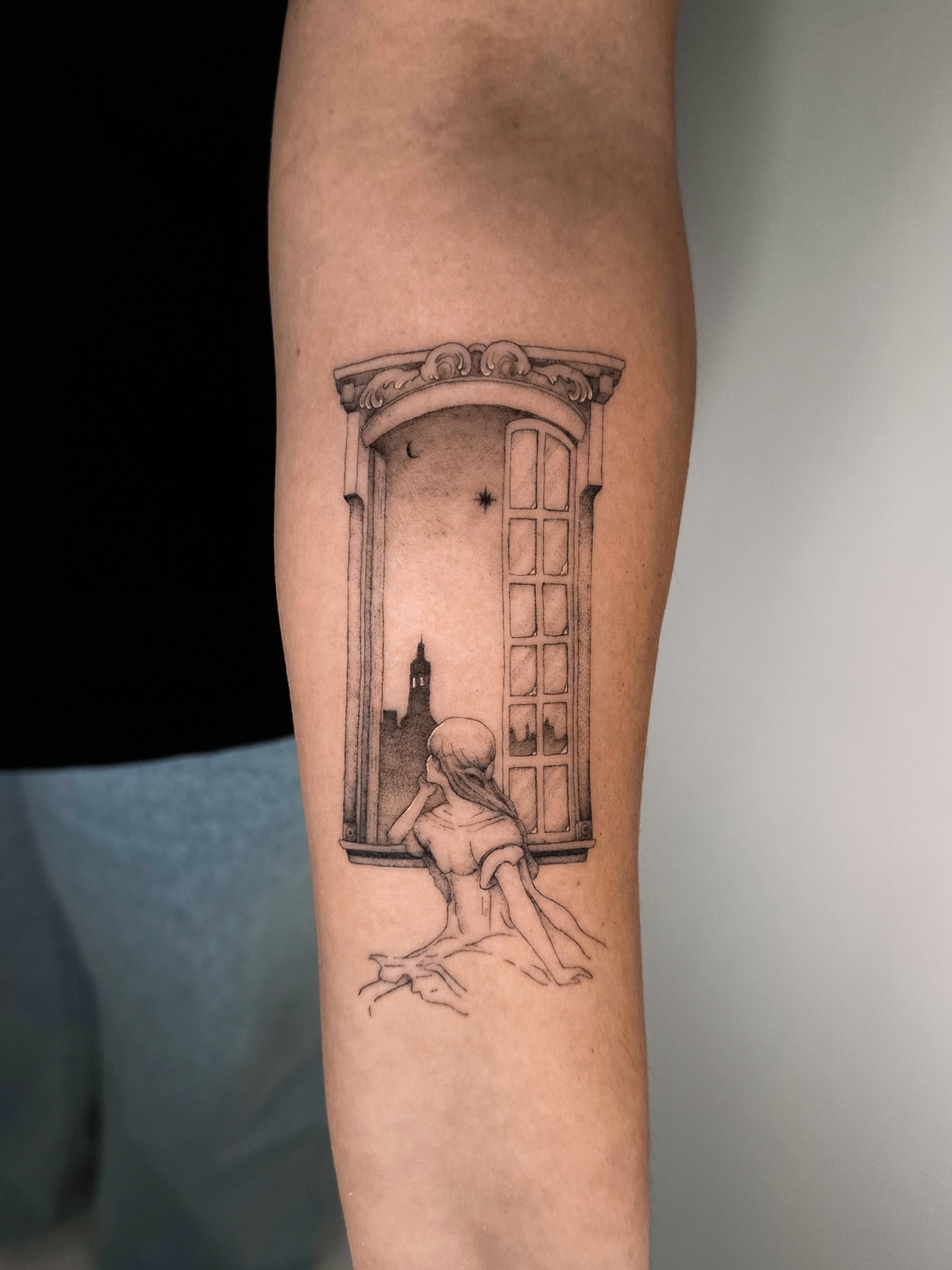 Window scene realism tattoo on the forearm by Lauren