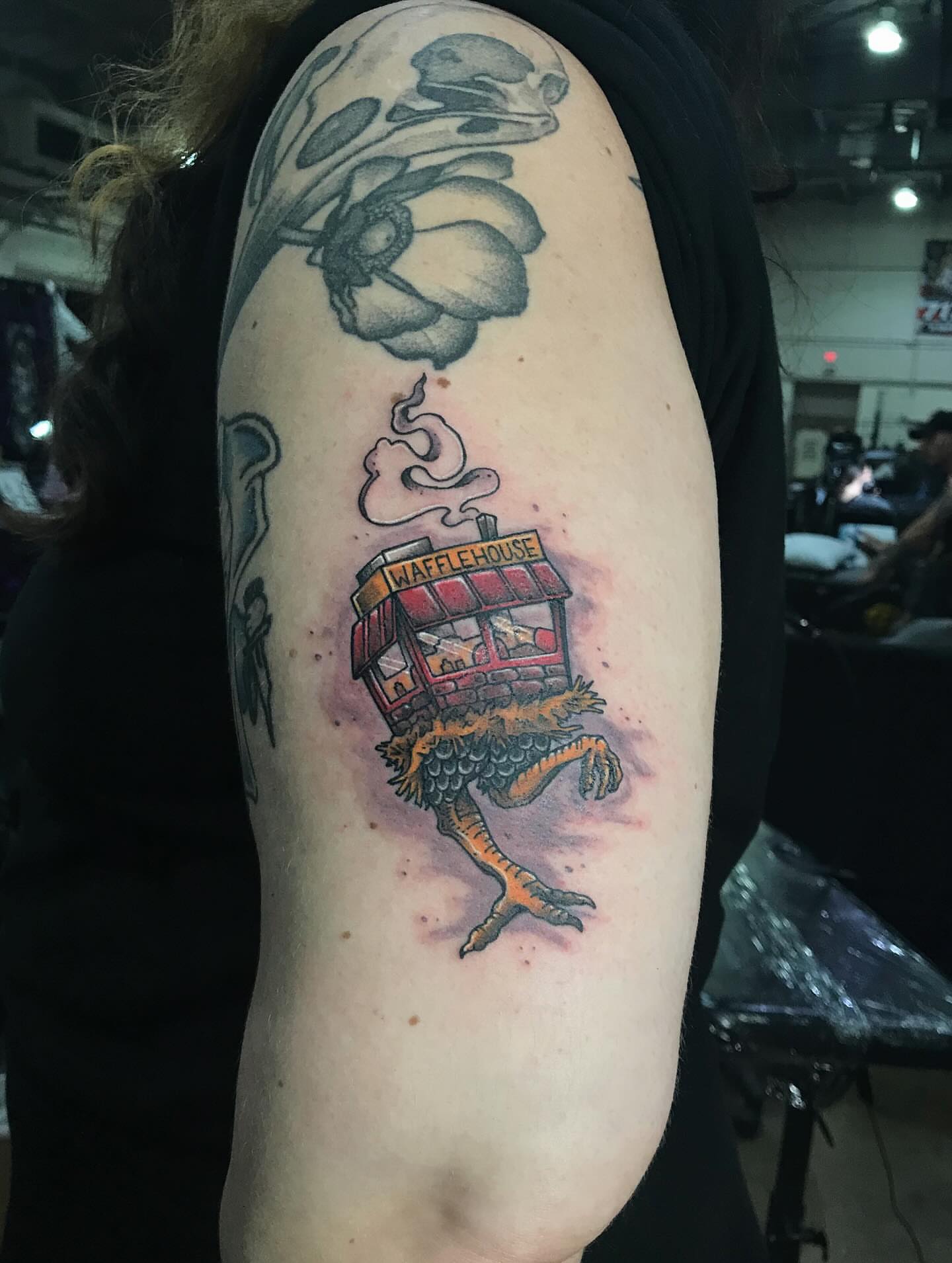 Waffle house rooster realism tattoo on the forearm by Brookelyn