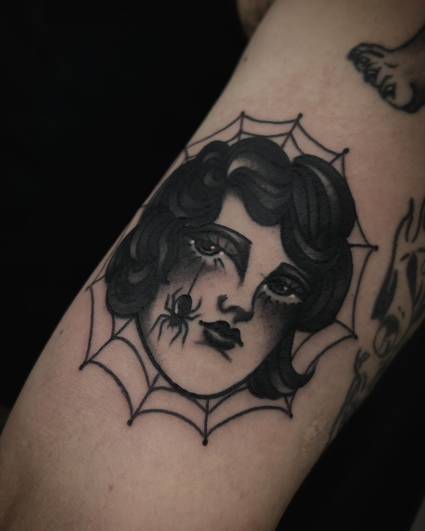 Woman with spiderweb dark realism tattoo on the forearm by Samantha C, Bremerton, Washington