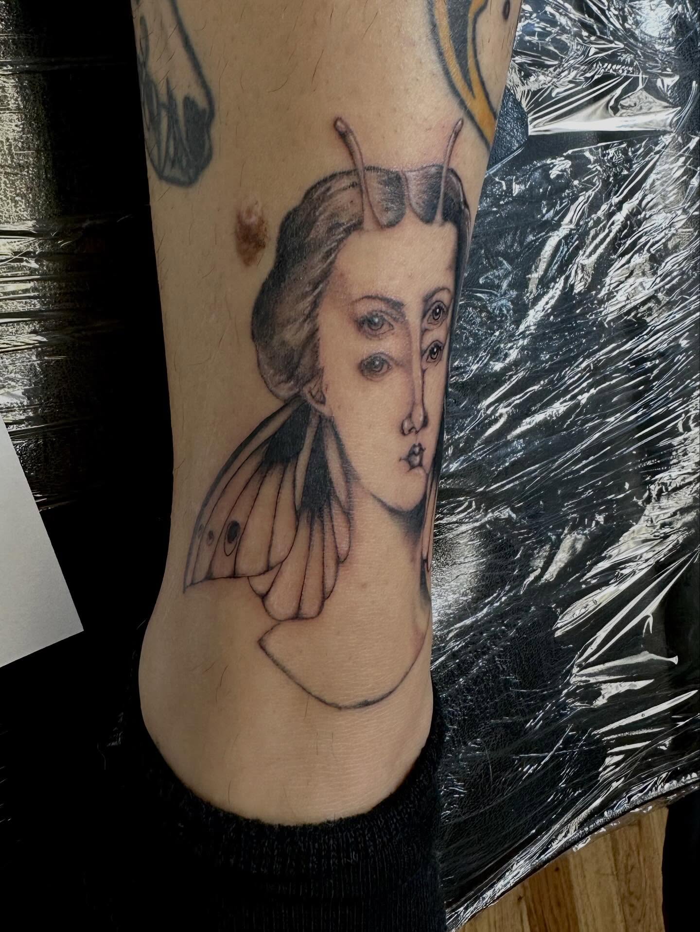 Woman with butterfly wings realism tattoo on the forearm by Marie Novotny, Lakewood, Ohio