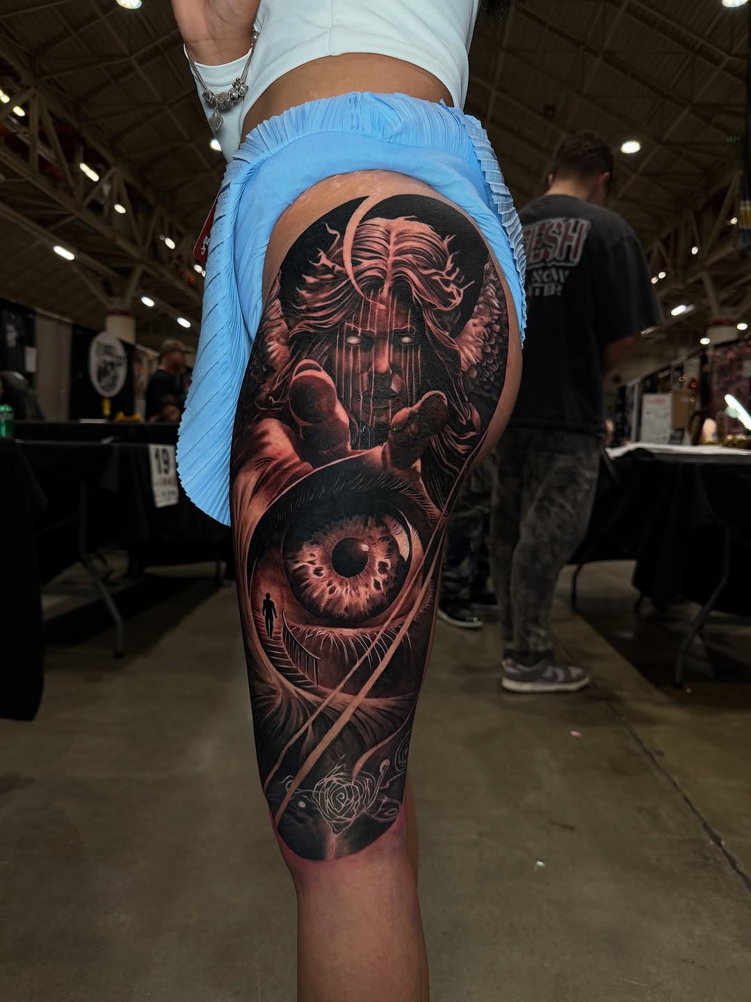 Surrealism tattoo on the thigh by Angels tattoo