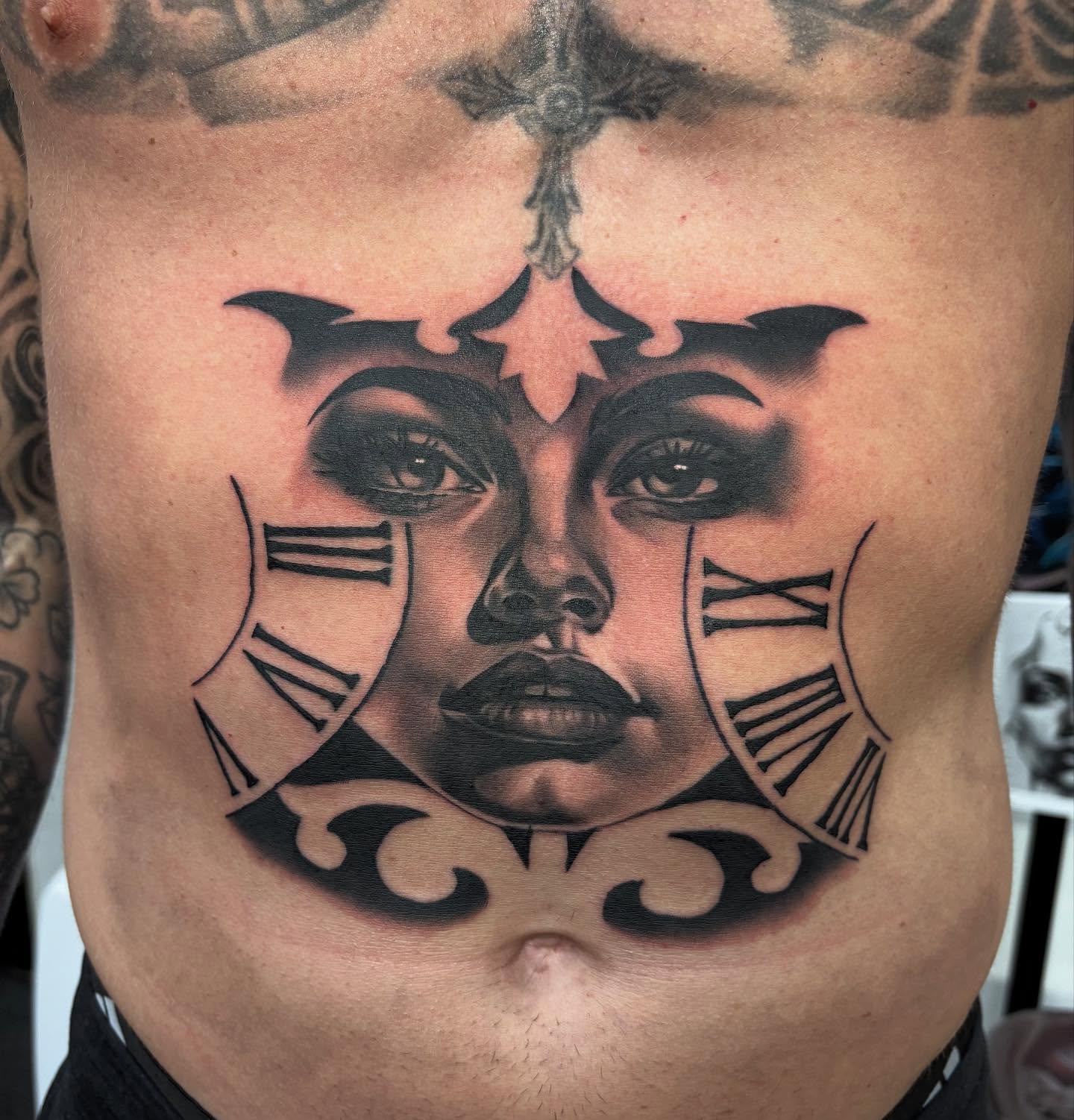 Woman's face realism tattoo on the chest by Mike Doherty, Abington, Massachusetts