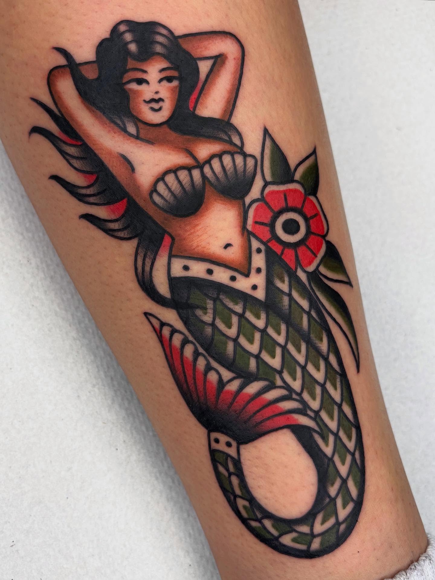 Mermaid American traditional tattoo on the forearm by Arturo Ledesma
