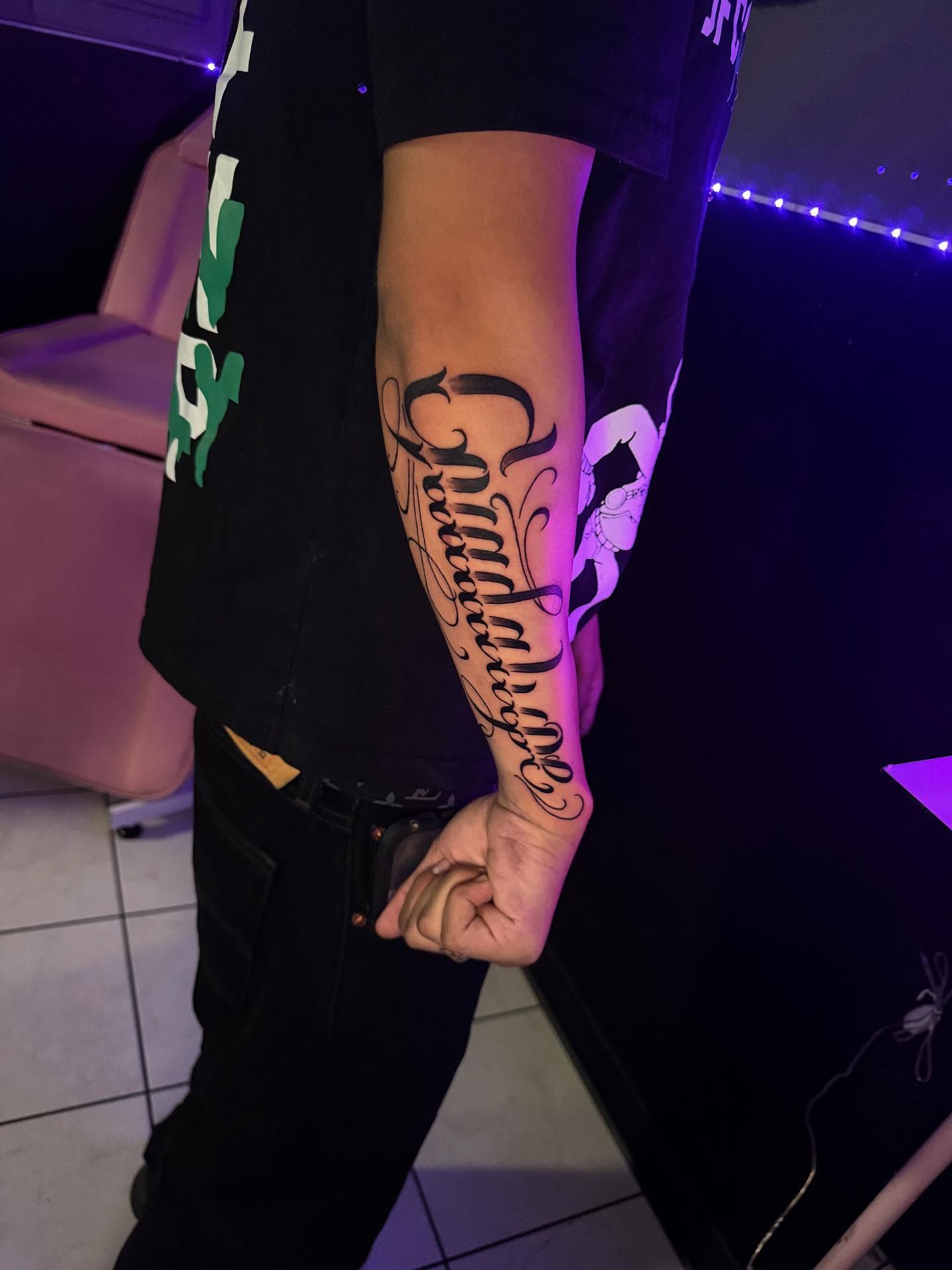 Script lettering lettering script tattoo on the forearm by Jasmin Lozano