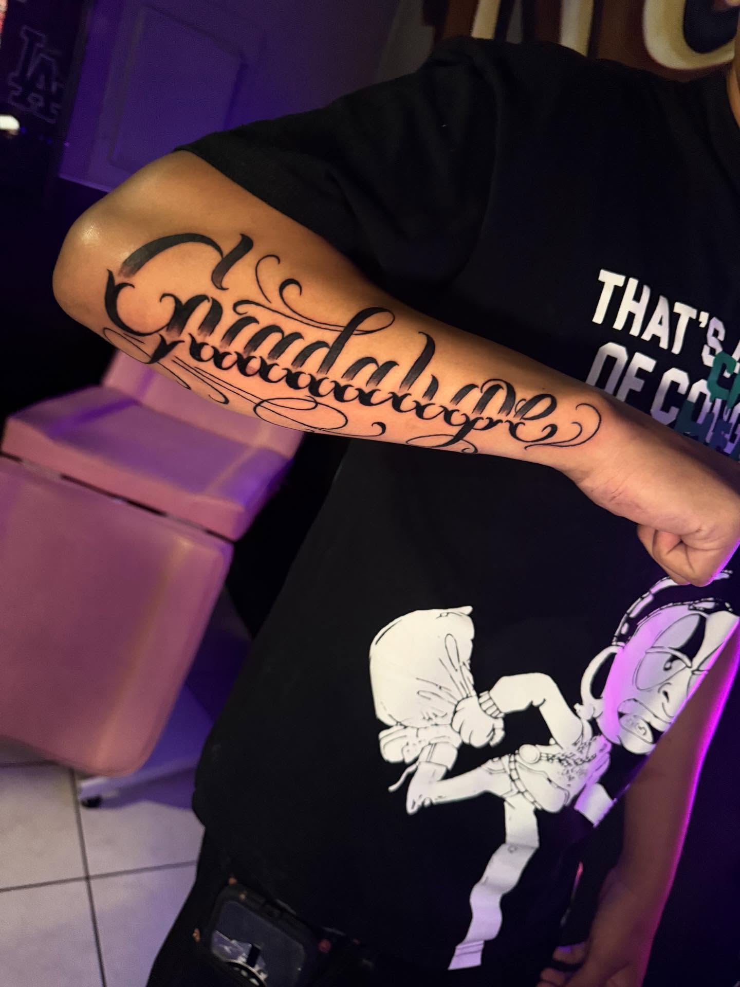 Script lettering lettering script tattoo on the forearm by Jasmin Lozano