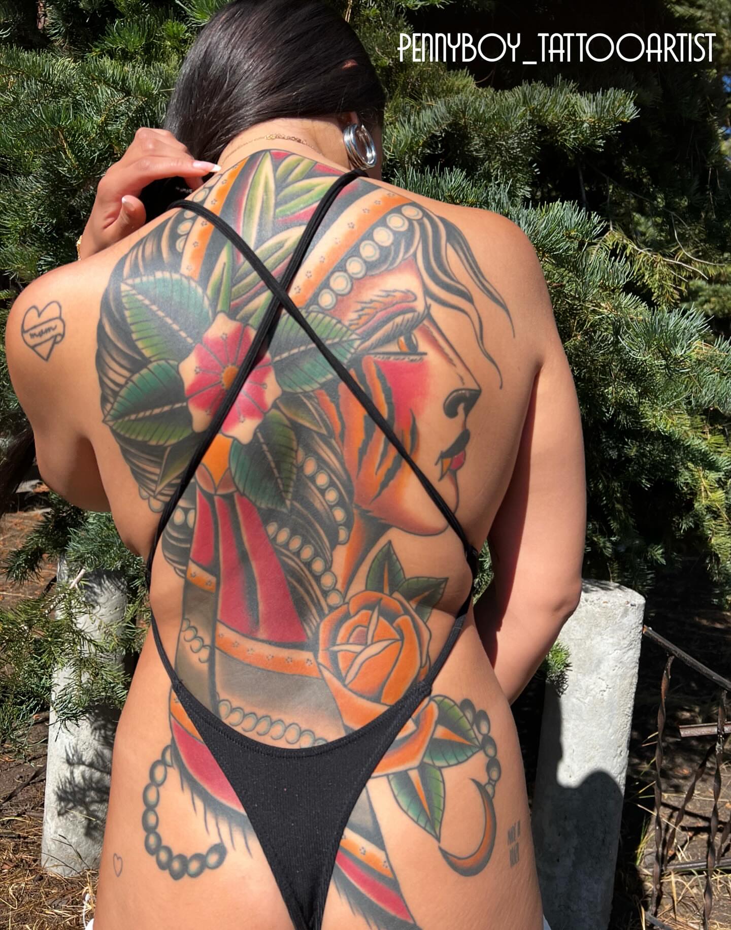 Woman American traditional tattoo on the back by Alessandro Pennella