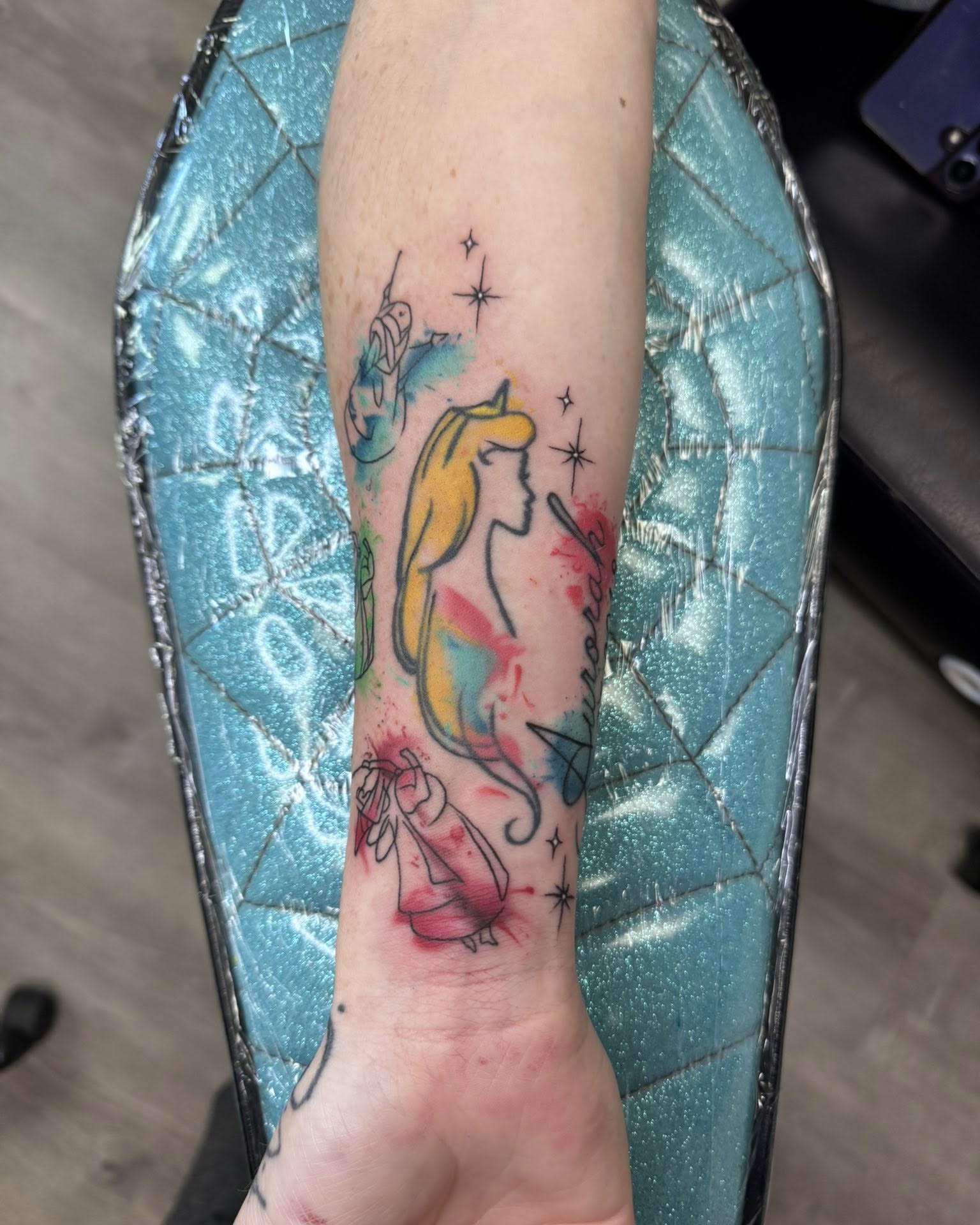 Mermaid watercolor tattoo on the forearm by Murbee
