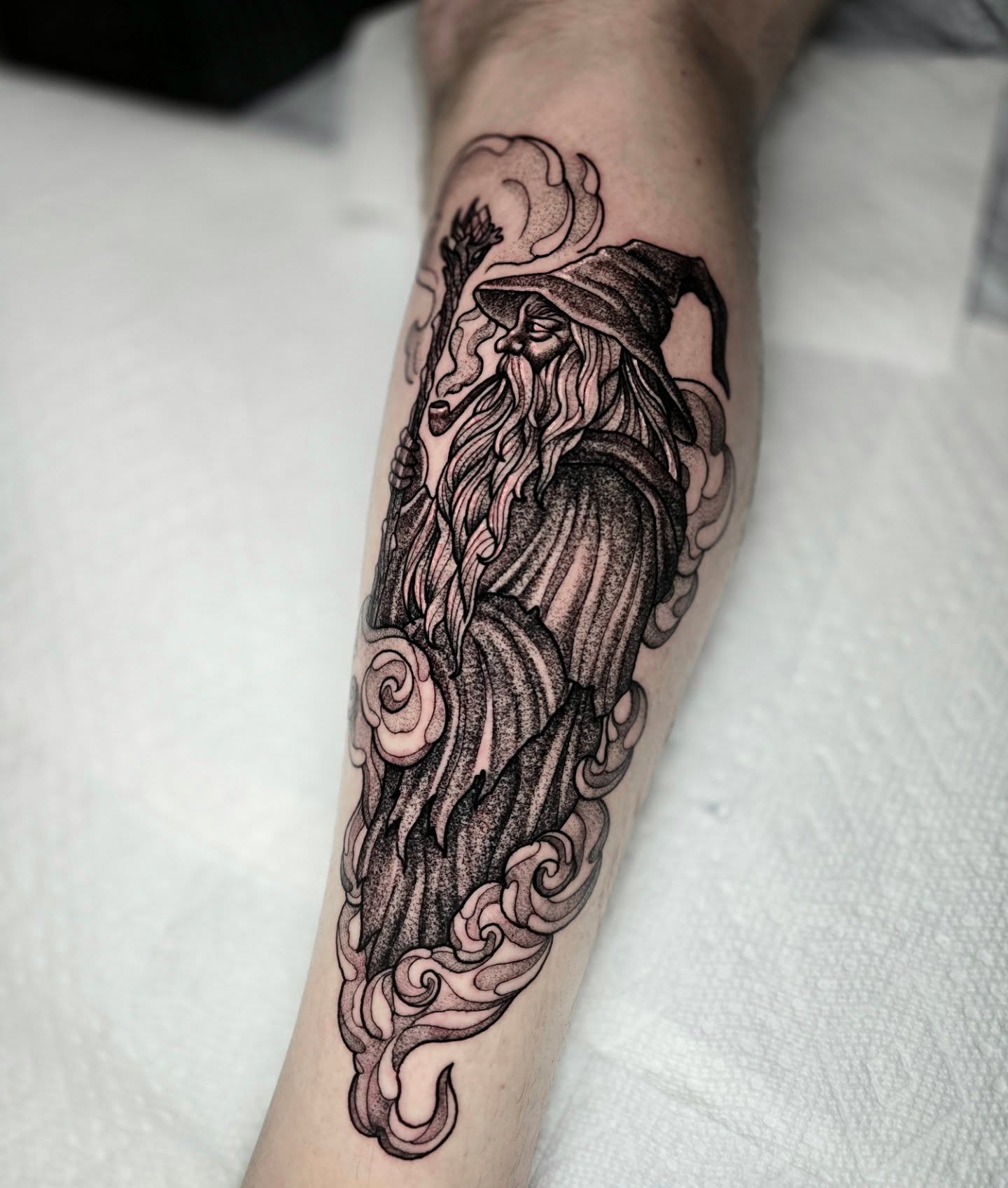 Wizard black and grey tattoo on the forearm by Adison Essig