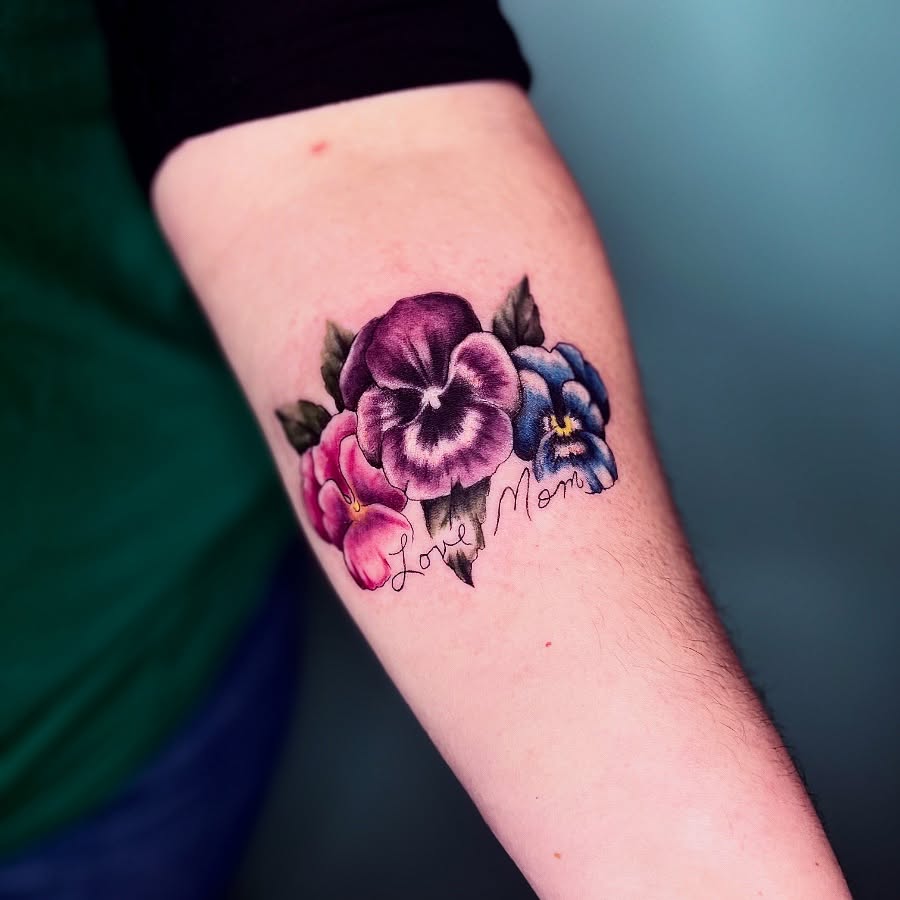 Flowers realism tattoo on the forearm by Sydney Rose