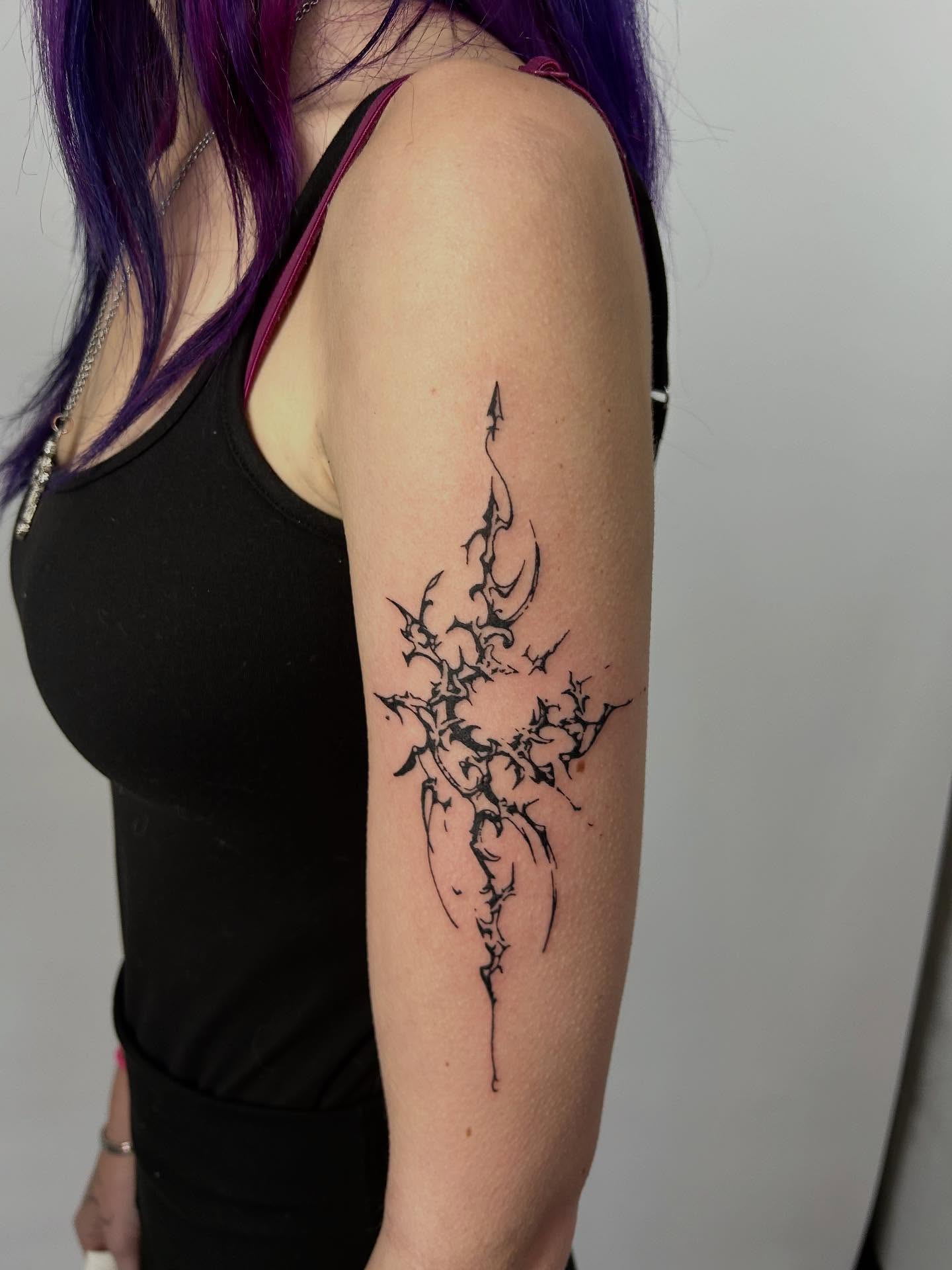 Abstract design black and grey tattoo on the forearm by Lip™