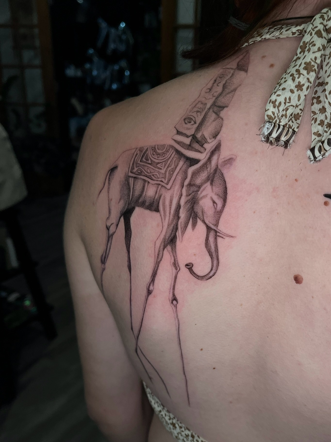 Elephant black and grey tattoo on the shoulder by Samantha