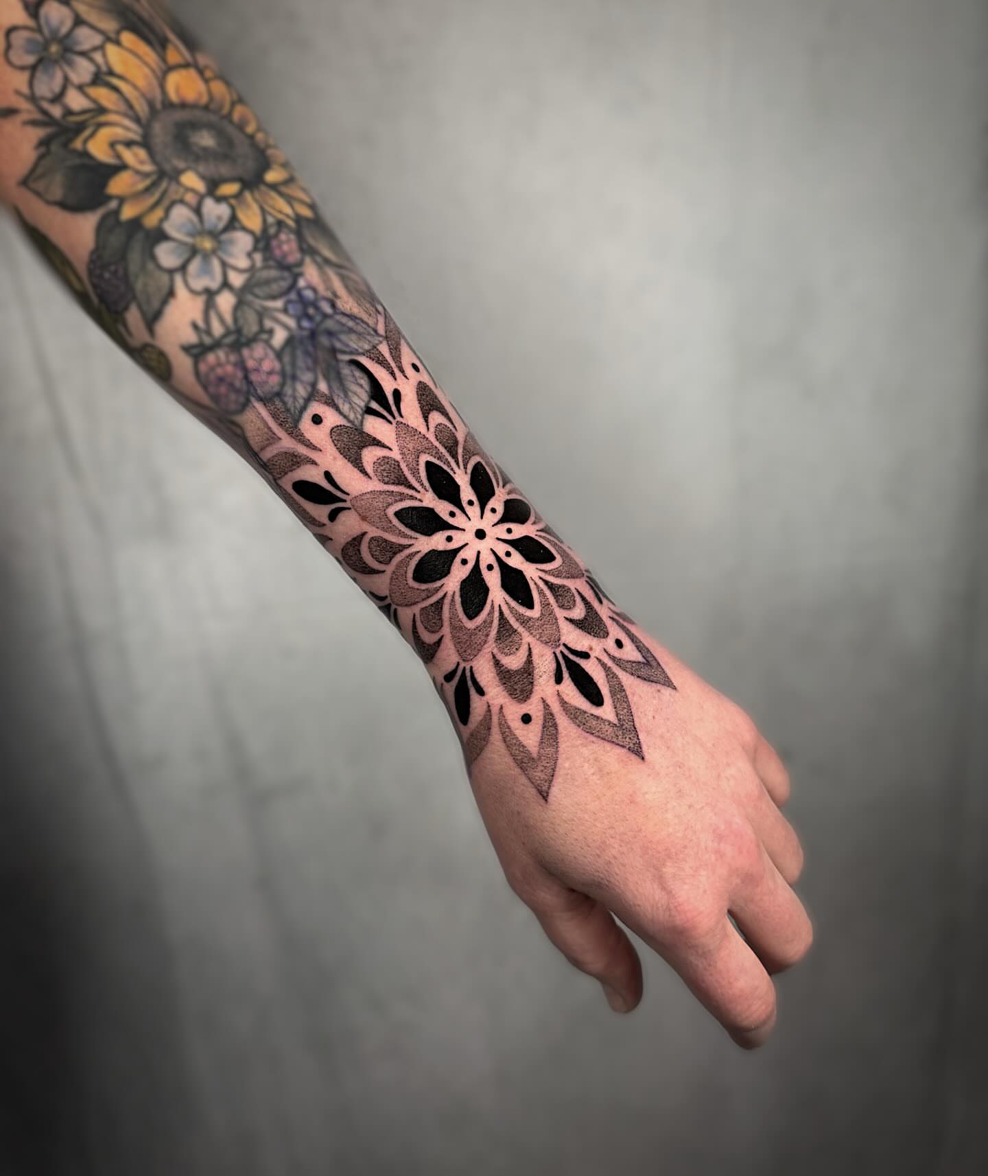 Floral mandala dotwork tattoo on the forearm by Mallory Miller π³οΈβπ Eugene