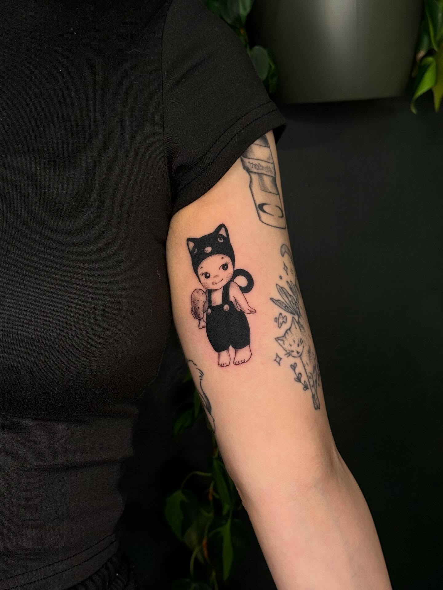 Cat character anime tattoo on the forearm by šianca٠࣪ā