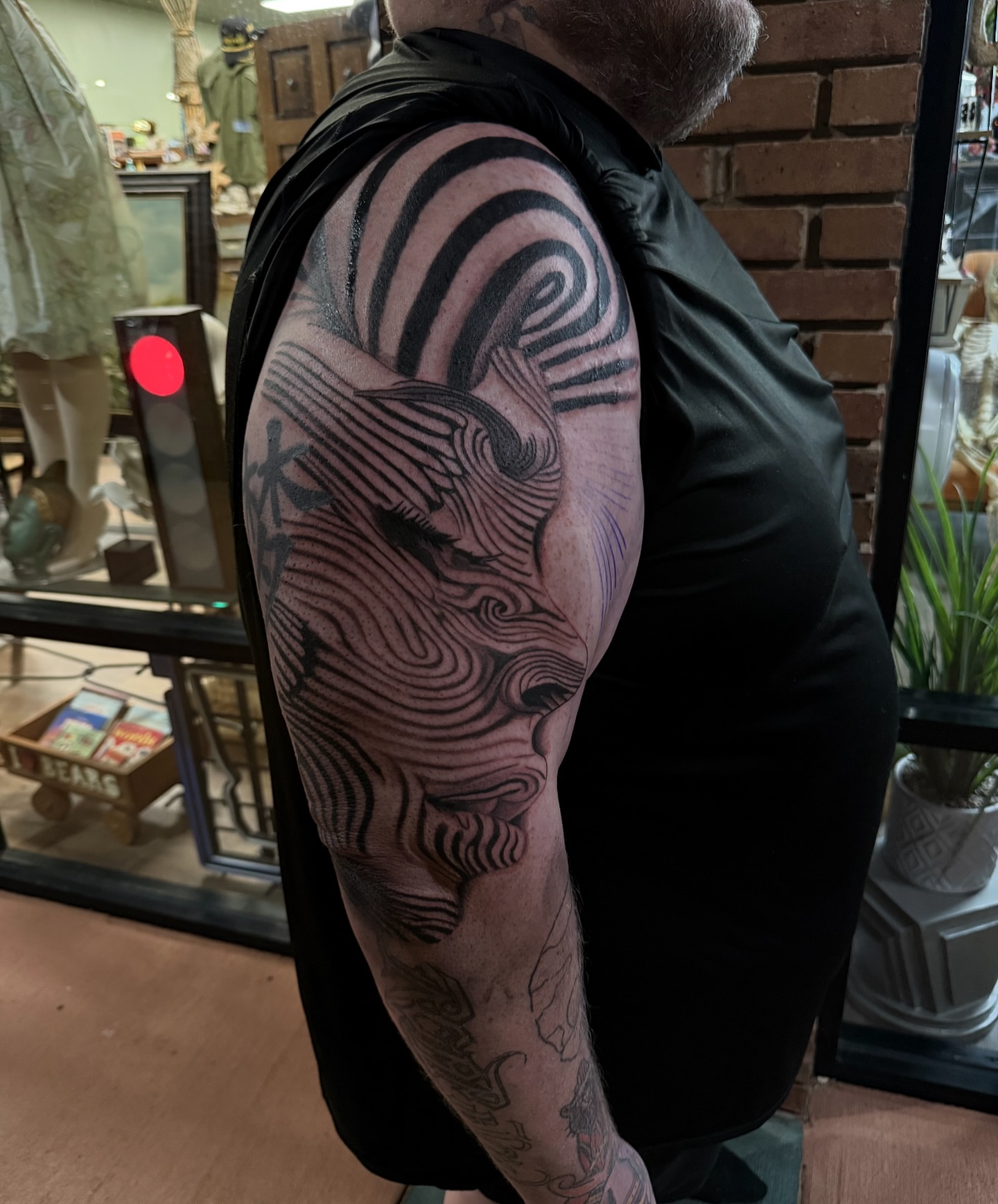 Tattoo by @itscalebbattles — black_and_grey, geometric