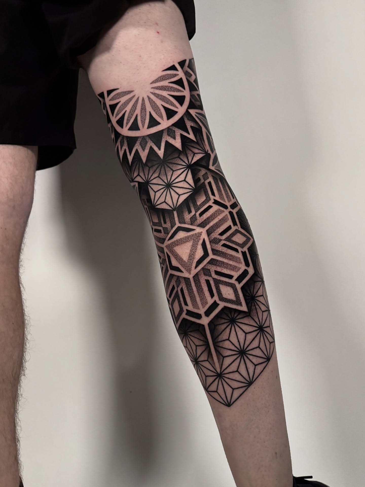 Geometric patterns geometric tattoo on the forearm by Mitch Koch