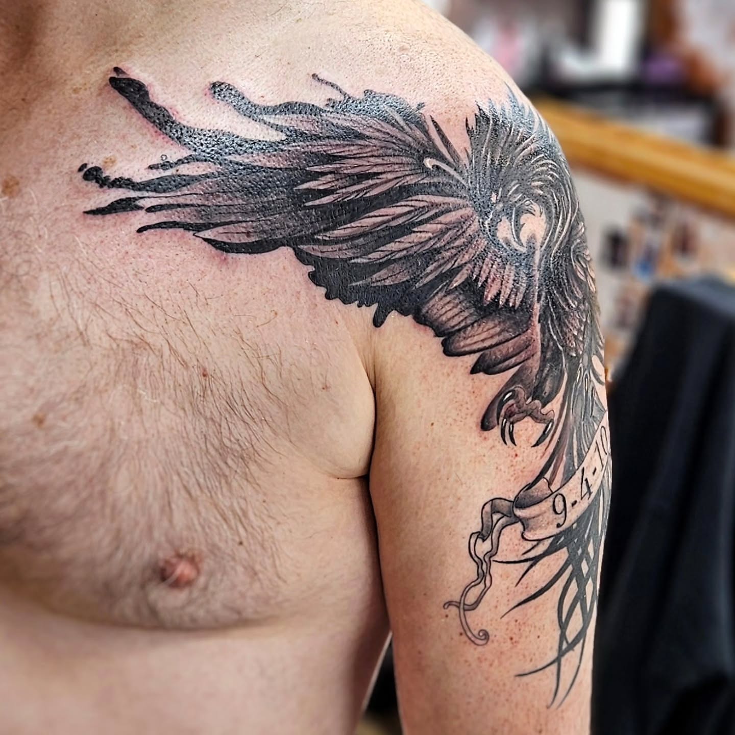 Eagle black and grey tattoo on the shoulder by Jordanna Pearl