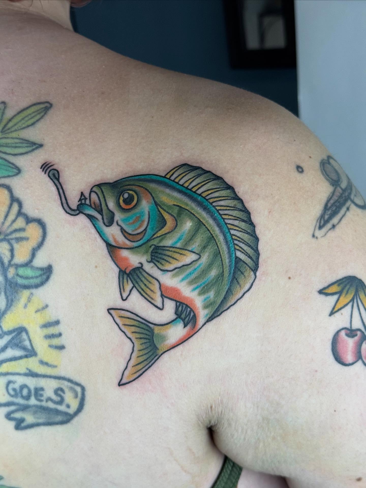 Fish American traditional tattoo on the shoulder by π©πͺπ¬