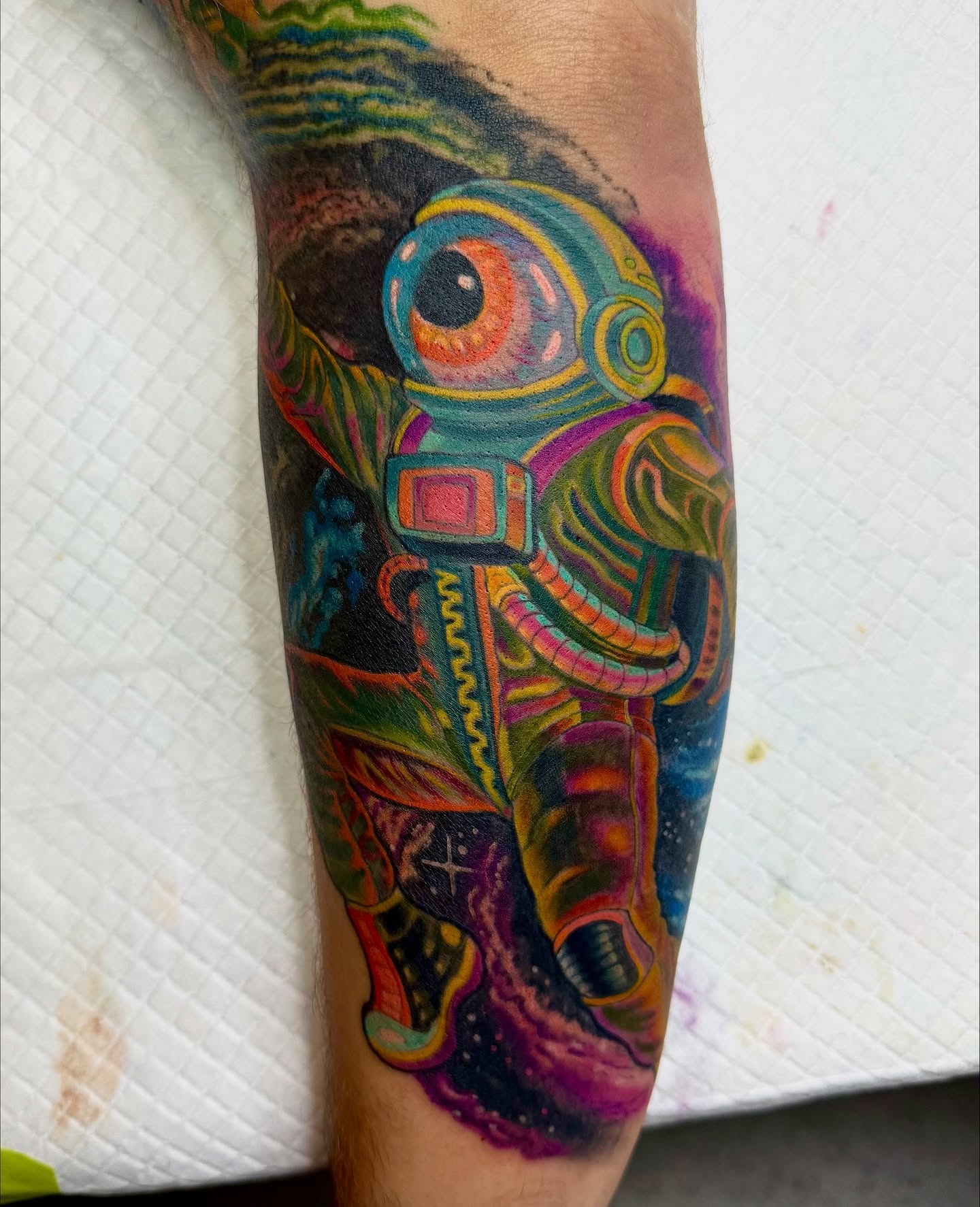 Astronaut new school tattoo on the forearm by Bacon 🥓