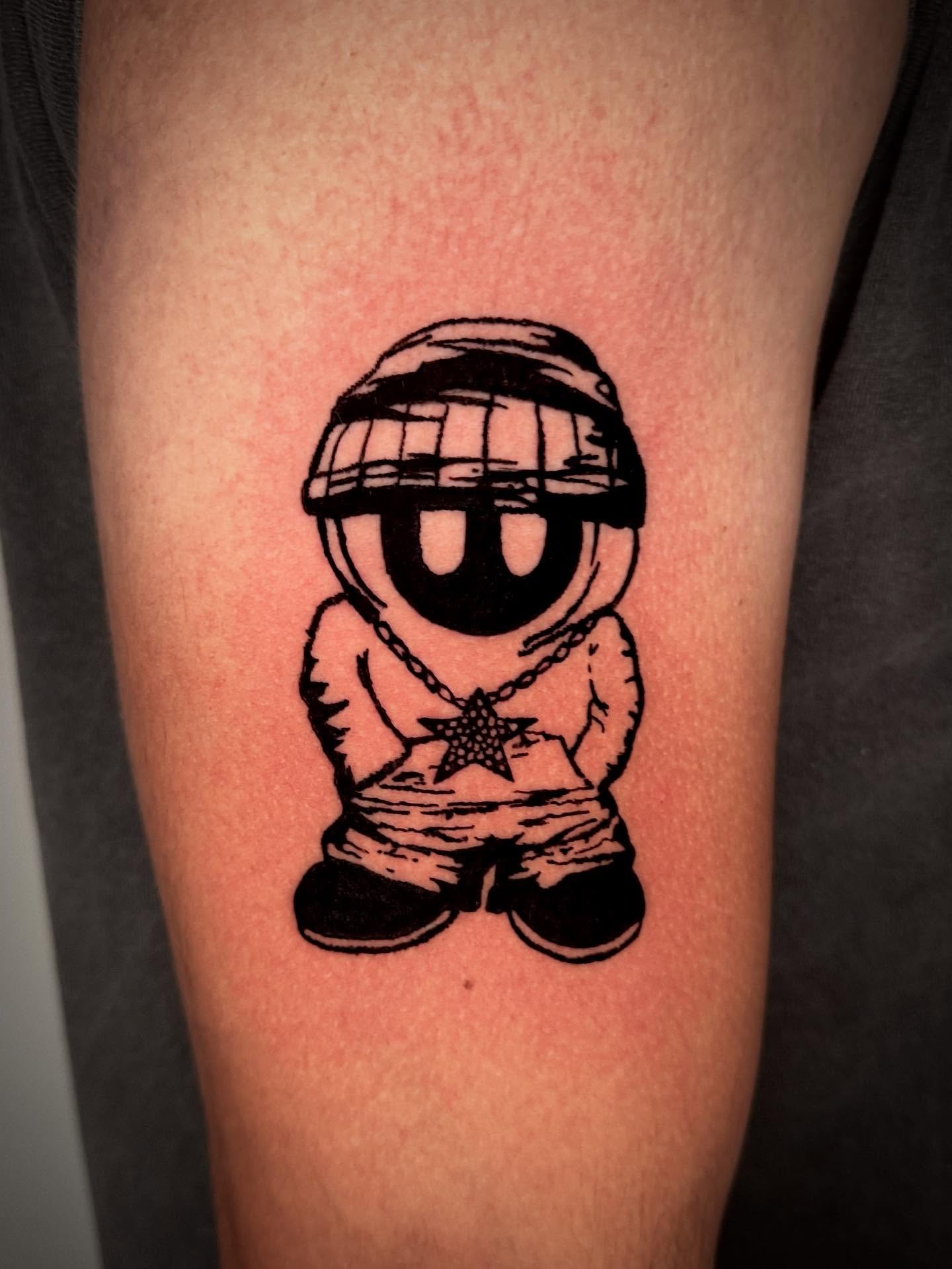 Astronaut black and grey tattoo on the forearm by 𝔠𝔲𝔯𝔱𝔦𝔰 ~ tattoo artist