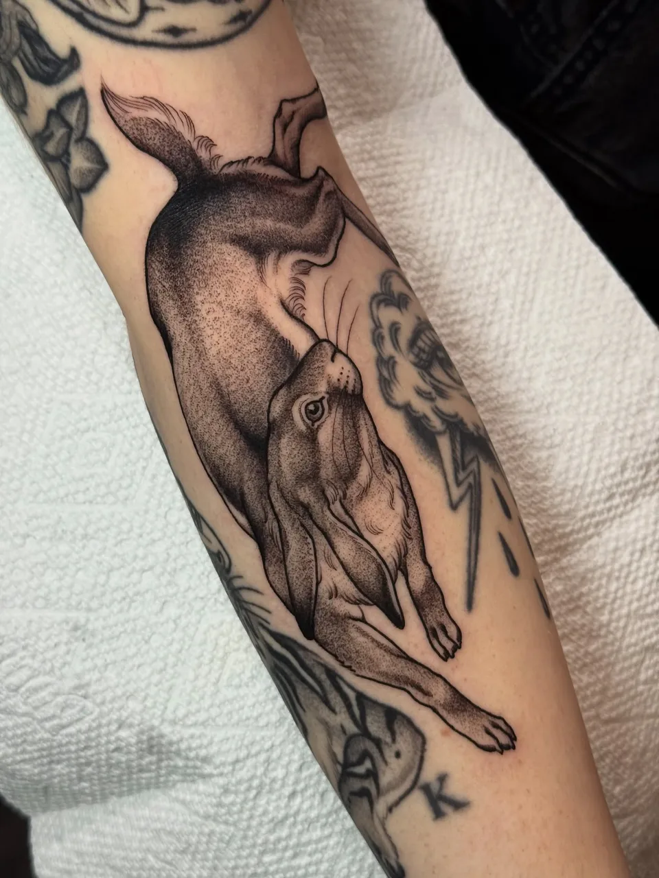 Dog dotwork tattoo on the forearm by Lauren Vandevier