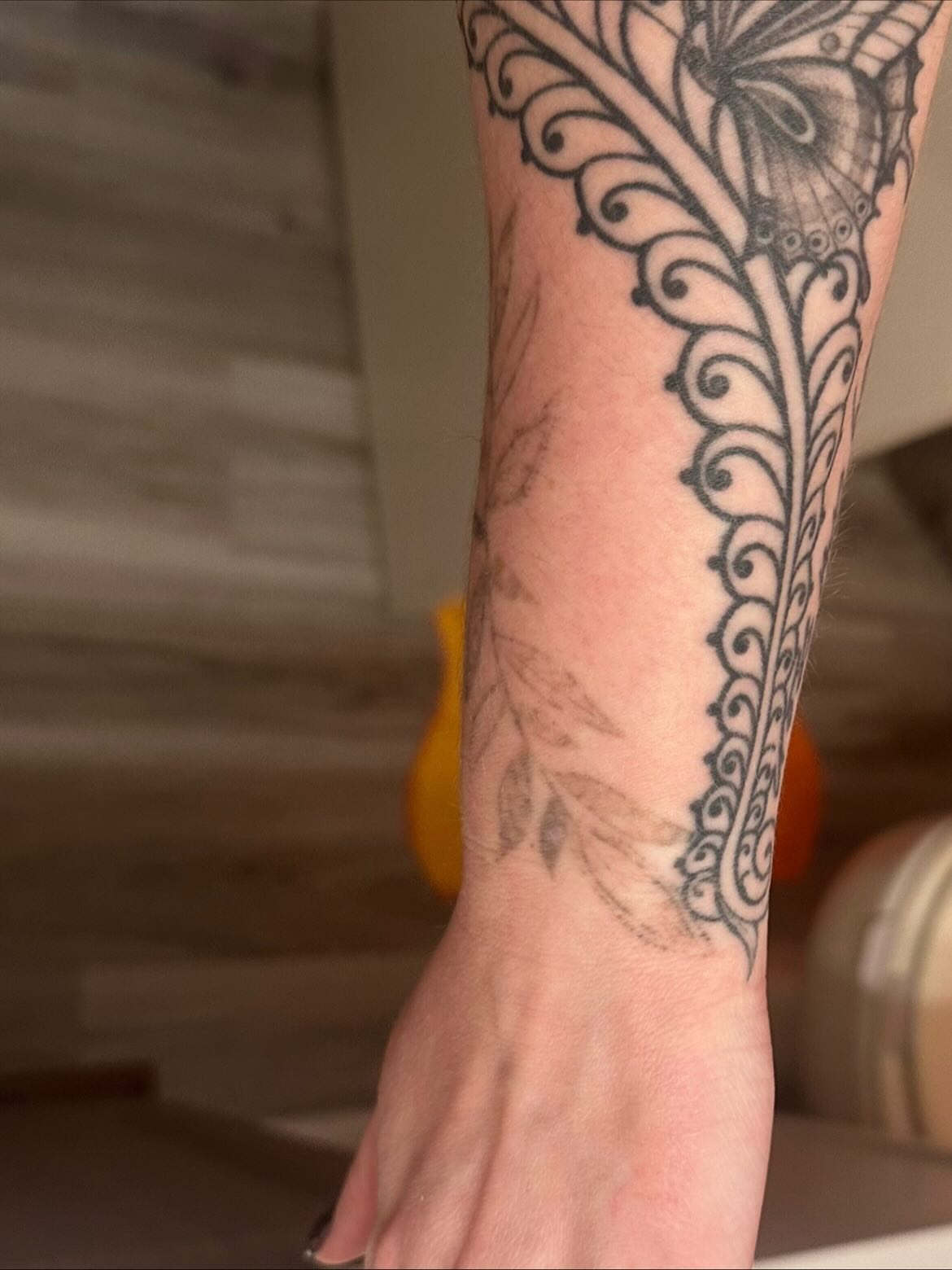 Scrollwork black and grey tattoo on the forearm by Danika Brooke 🧿