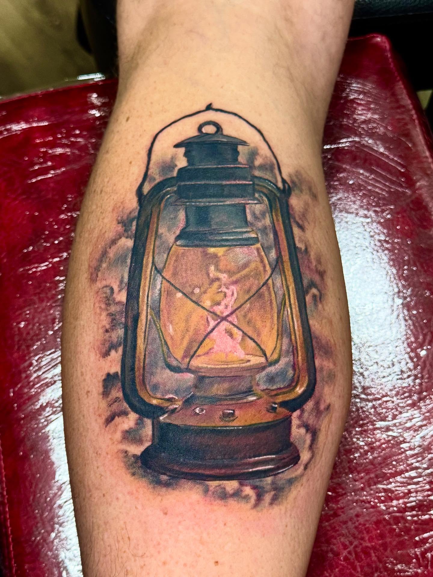 Oil lantern realism tattoo on the forearm by William Worley