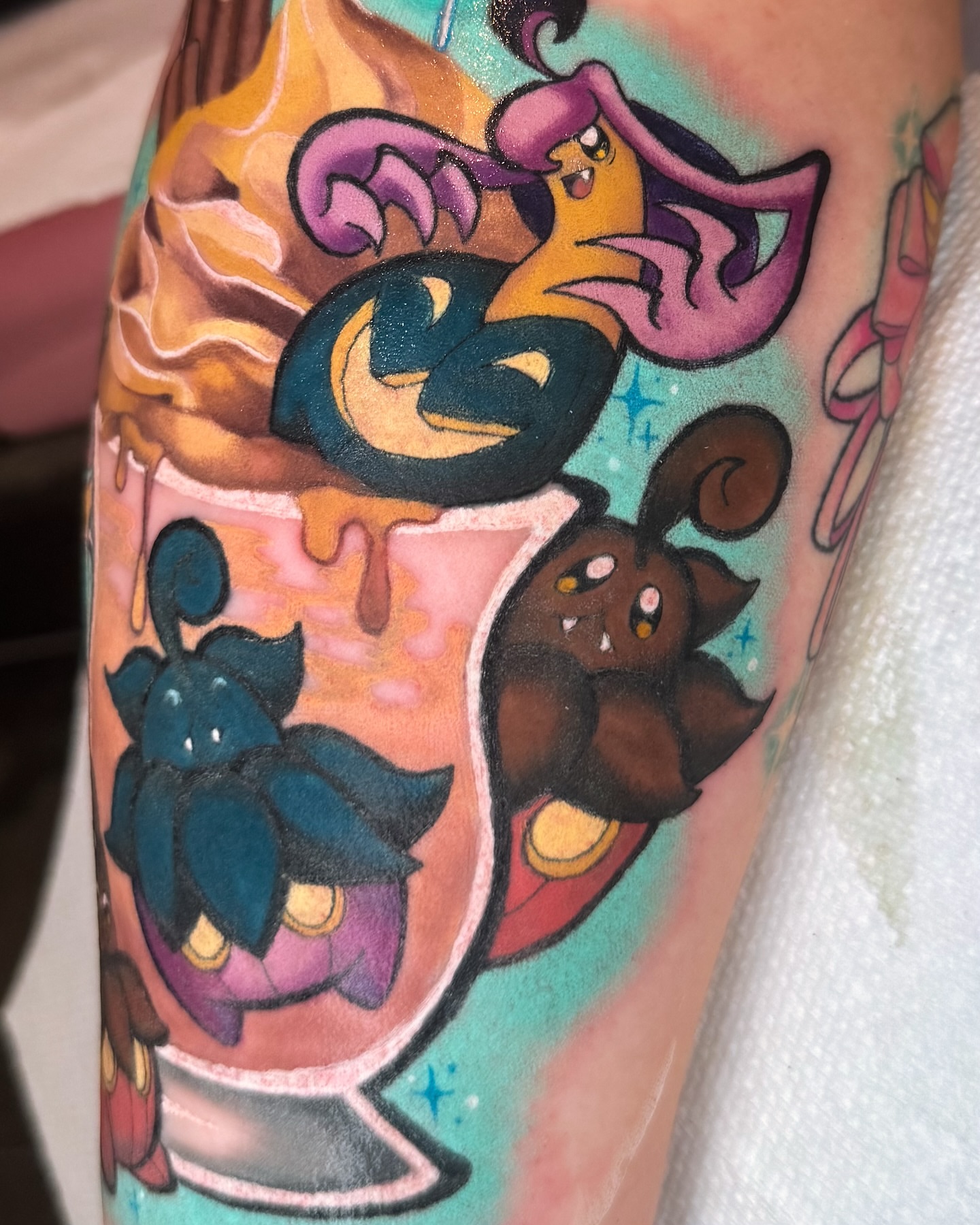 Milkshake with Pokémon new school tattoo on the forearm by 𝔐𝔞𝔯𝔰 ✨