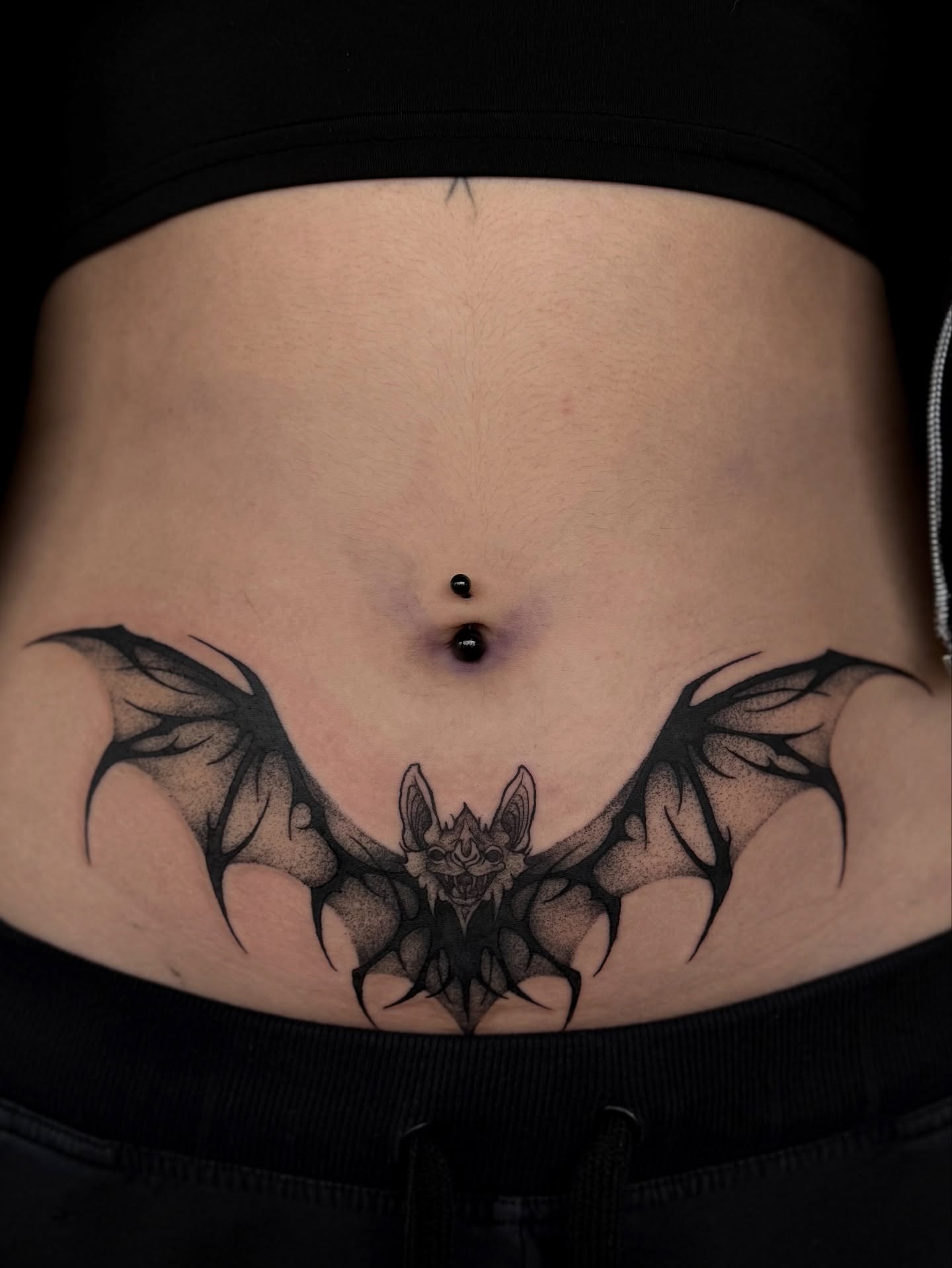 Bat black and grey tattoo on the torso by 𝔈𝔩𝔦𝔷𝔞𝔟𝔢𝔱𝔥