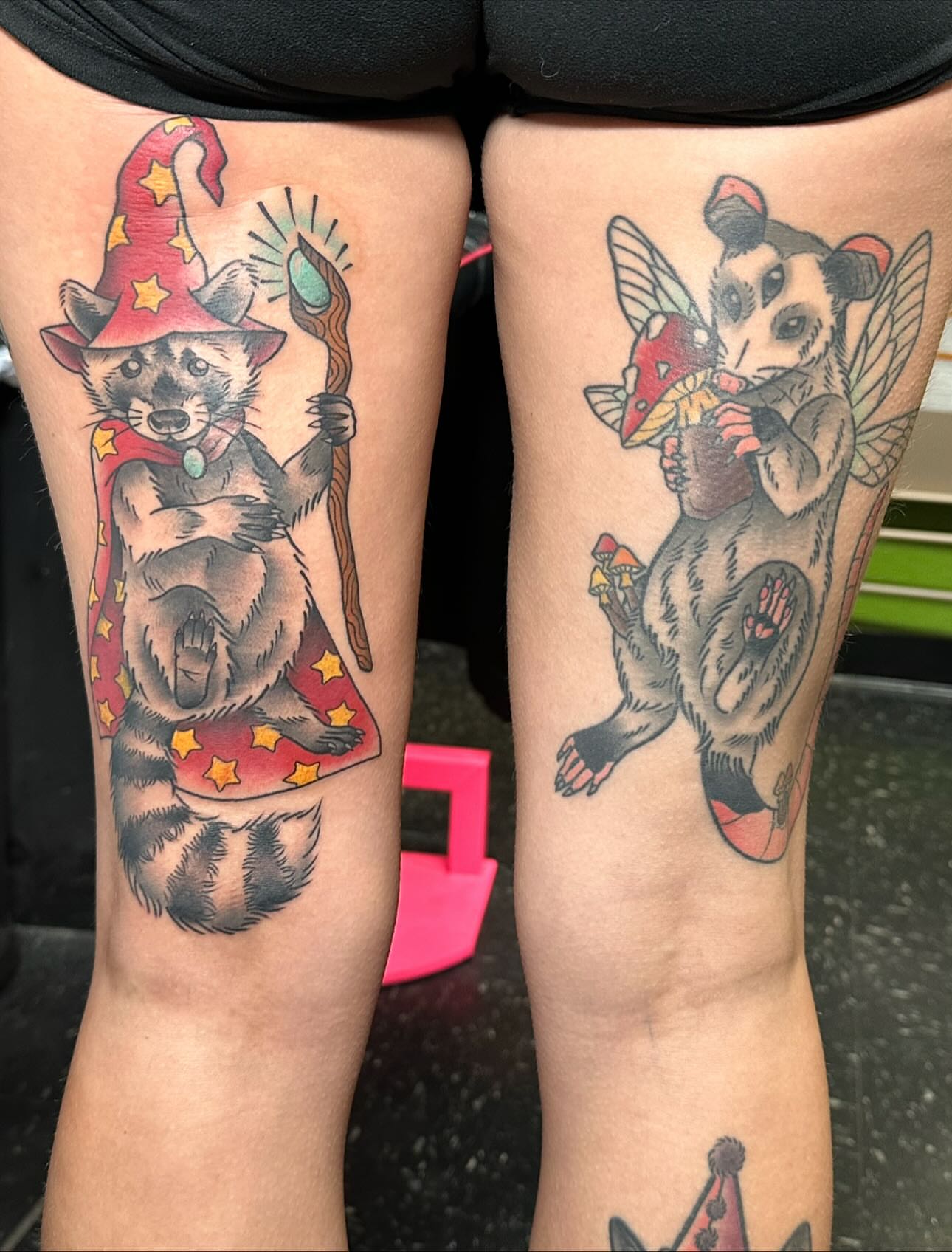 Raccoon wizard and opossum fairy American traditional tattoo on the thigh by Tattoo artist