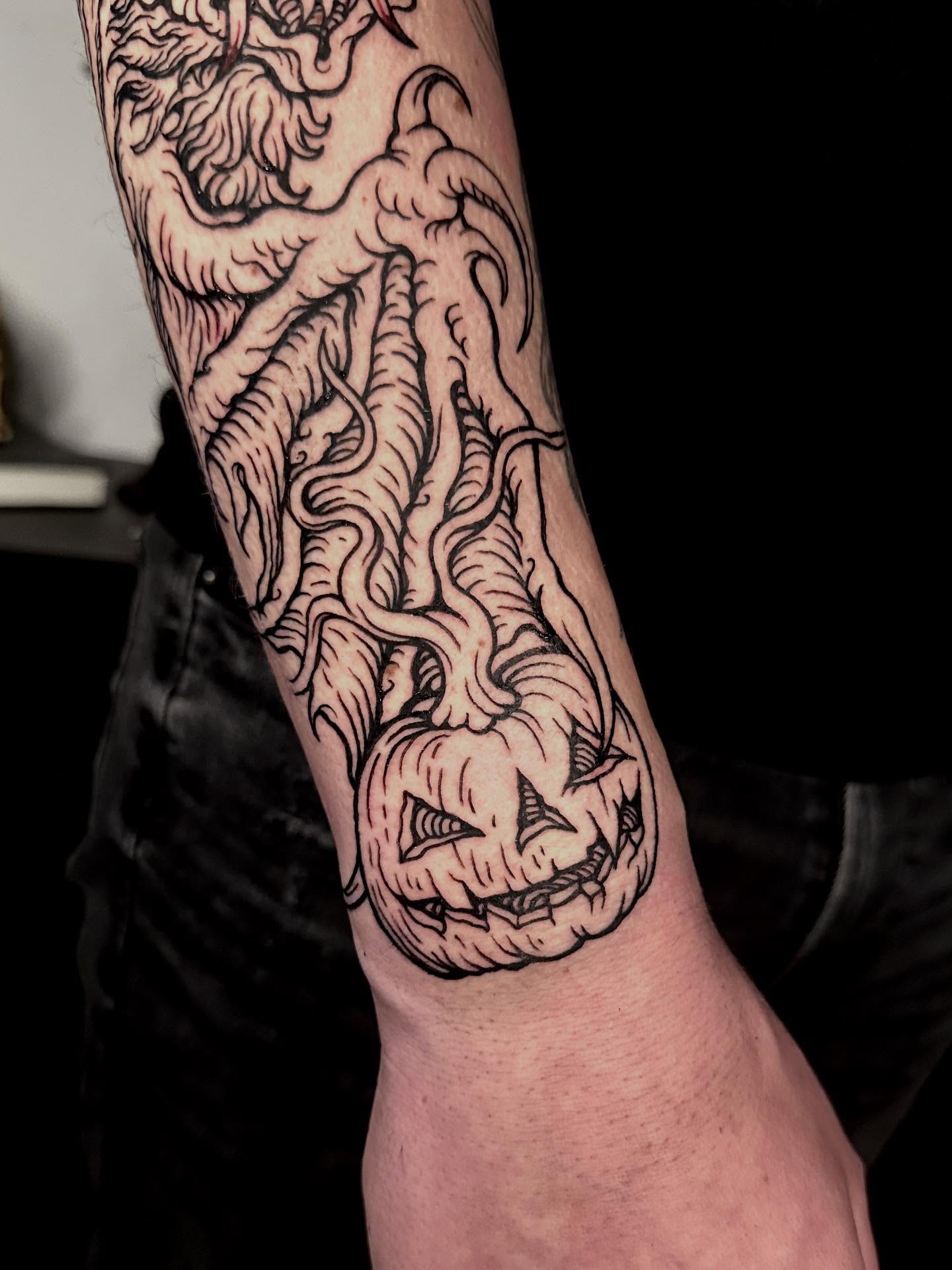 Pumpkin black and grey tattoo on the forearm by 𝕾𝖆𝖘𝖍𝖆 𝖂𝖔𝖑𝖆𝖓𝖉