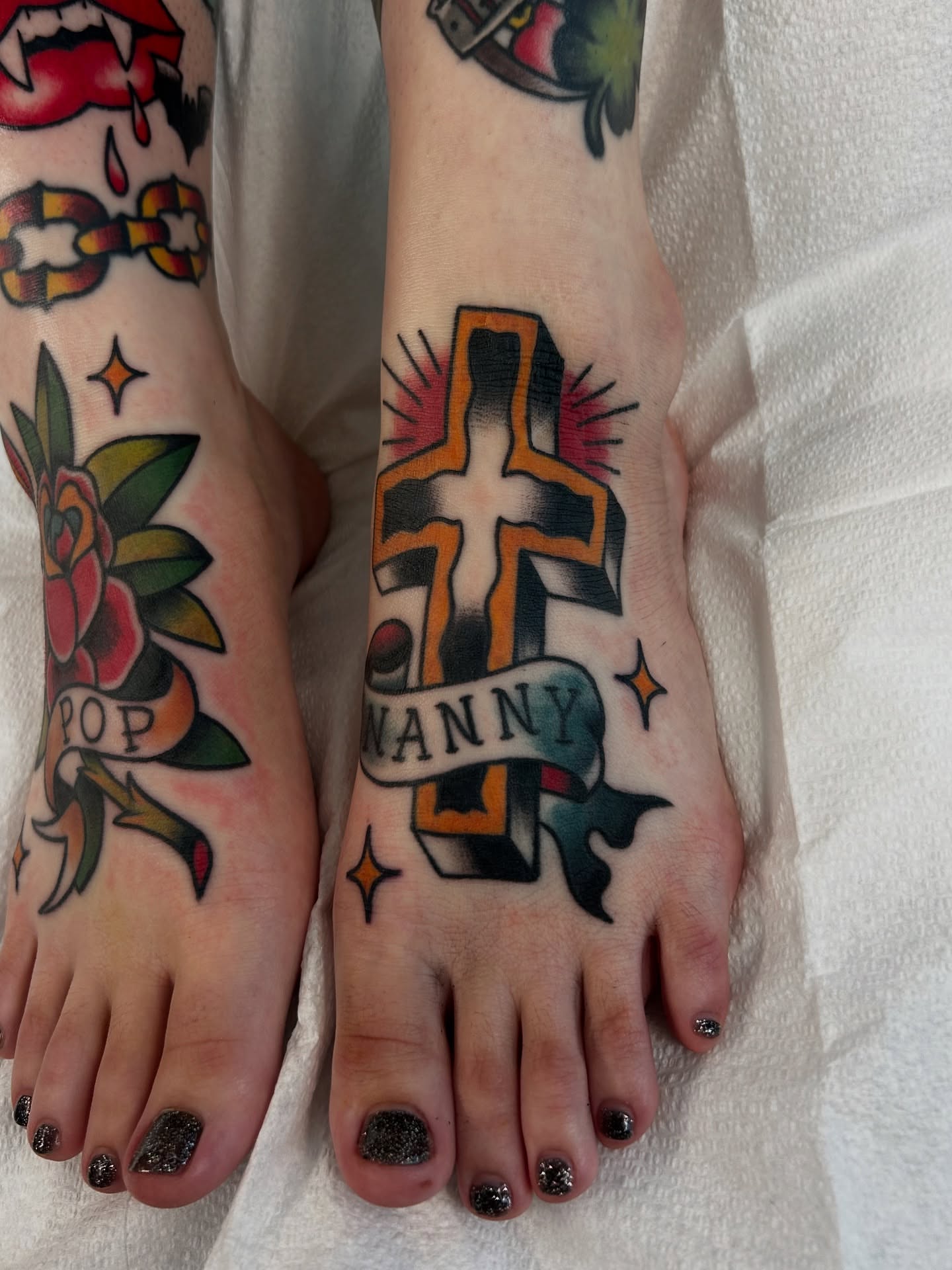 Cross and banner American traditional tattoo on the foot by Kim Goff - Special K